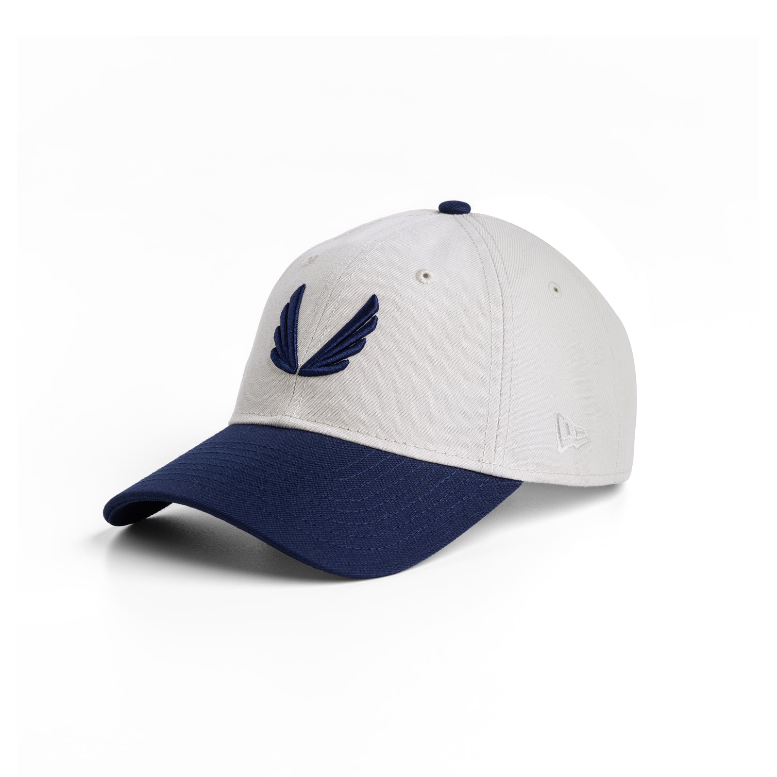 flatlay New Era 9Twenty strapback hat in stone and navy, front view