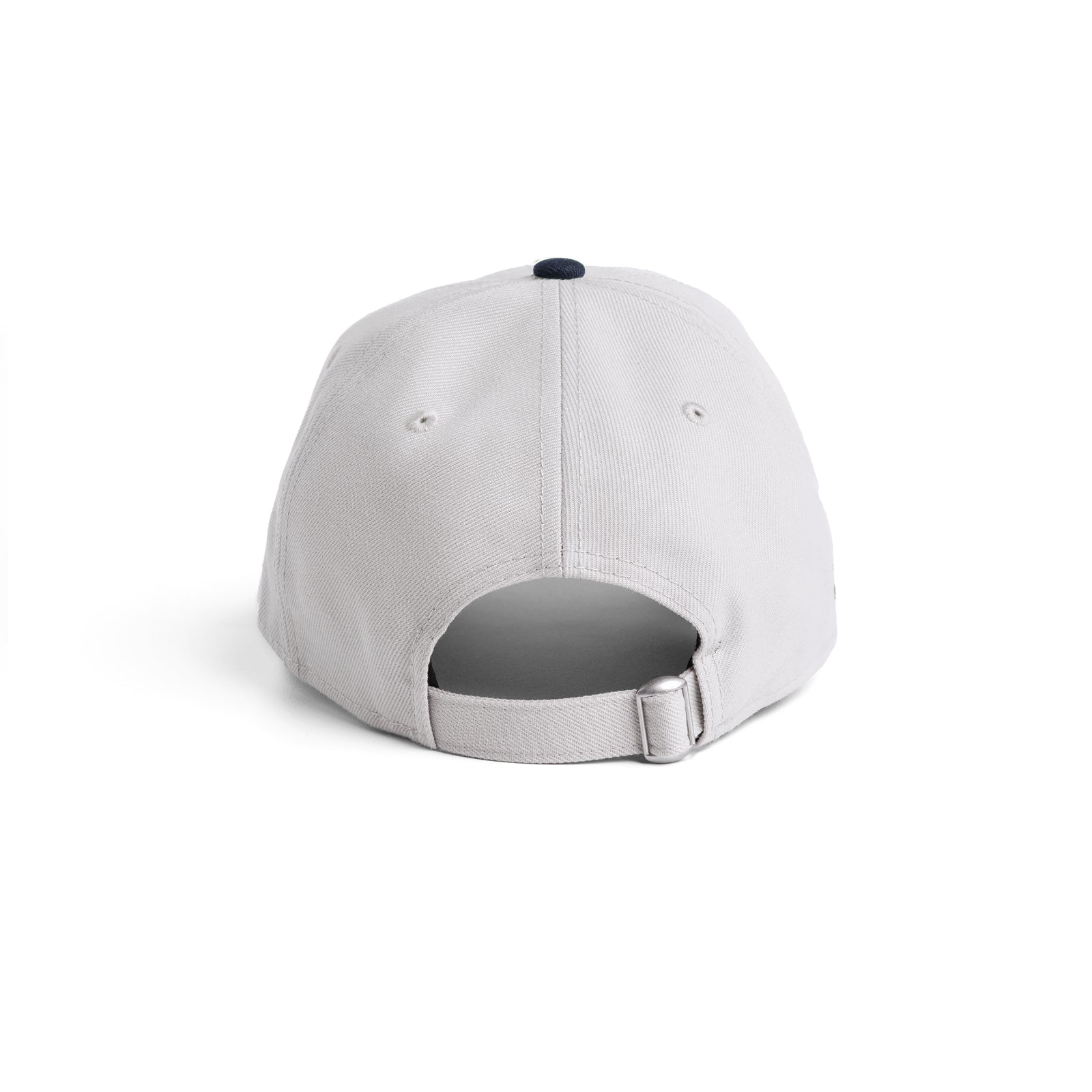 flatlay New Era 9Twenty strapback hat in stone and navy, back view