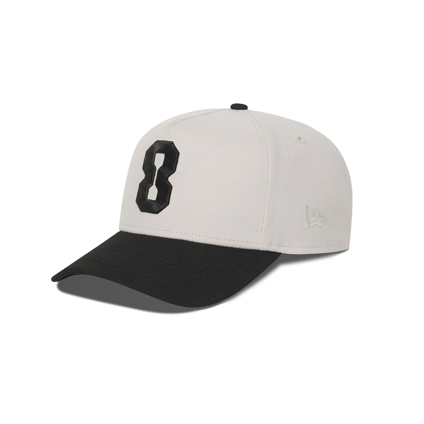 flatlay New Era 9Forty A-Frame Hat in stone and black with number 8 emblem, front angle view