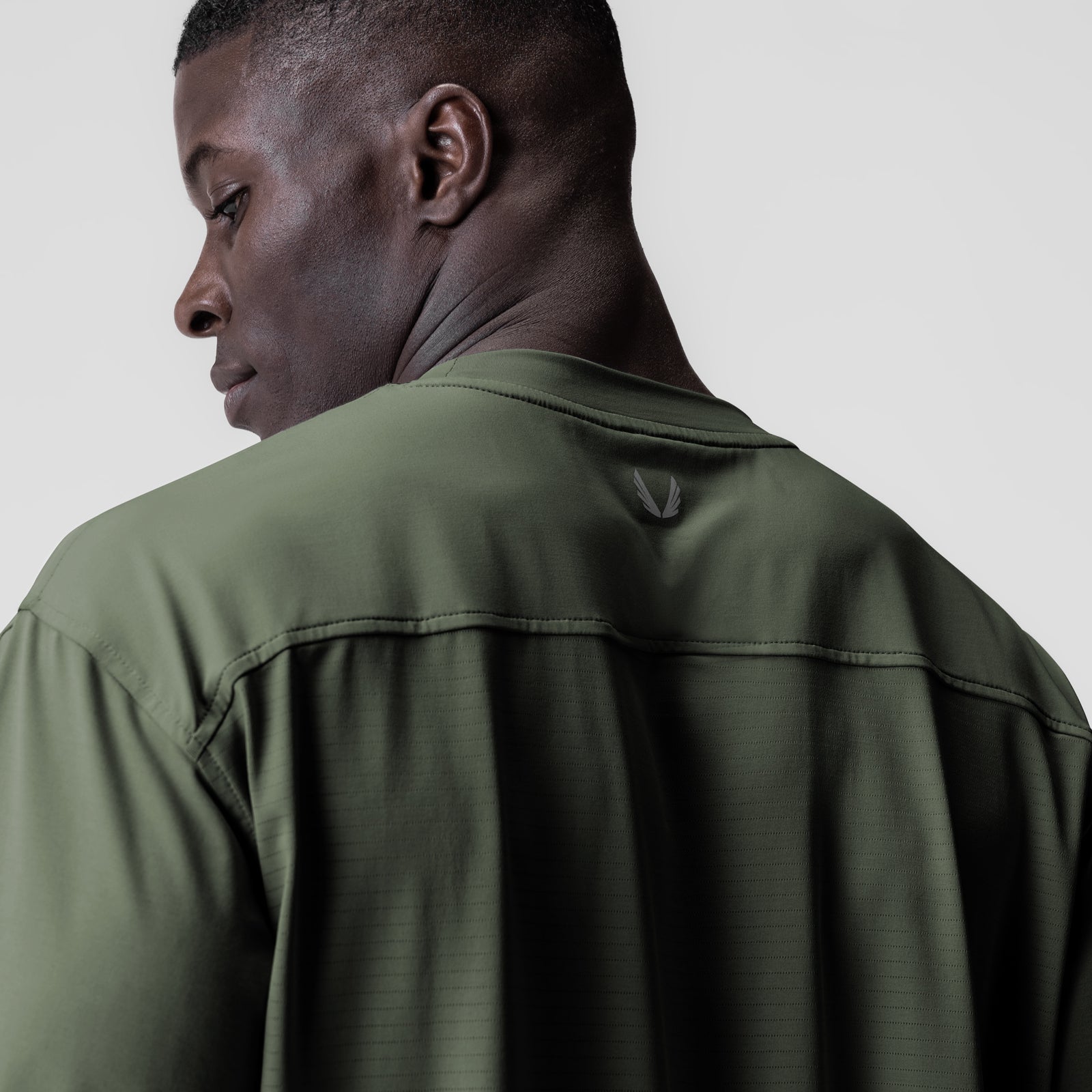 3D-Lite® 2.0 Lycra® 3/4-sleeve oversized tee in olive, rear view on model