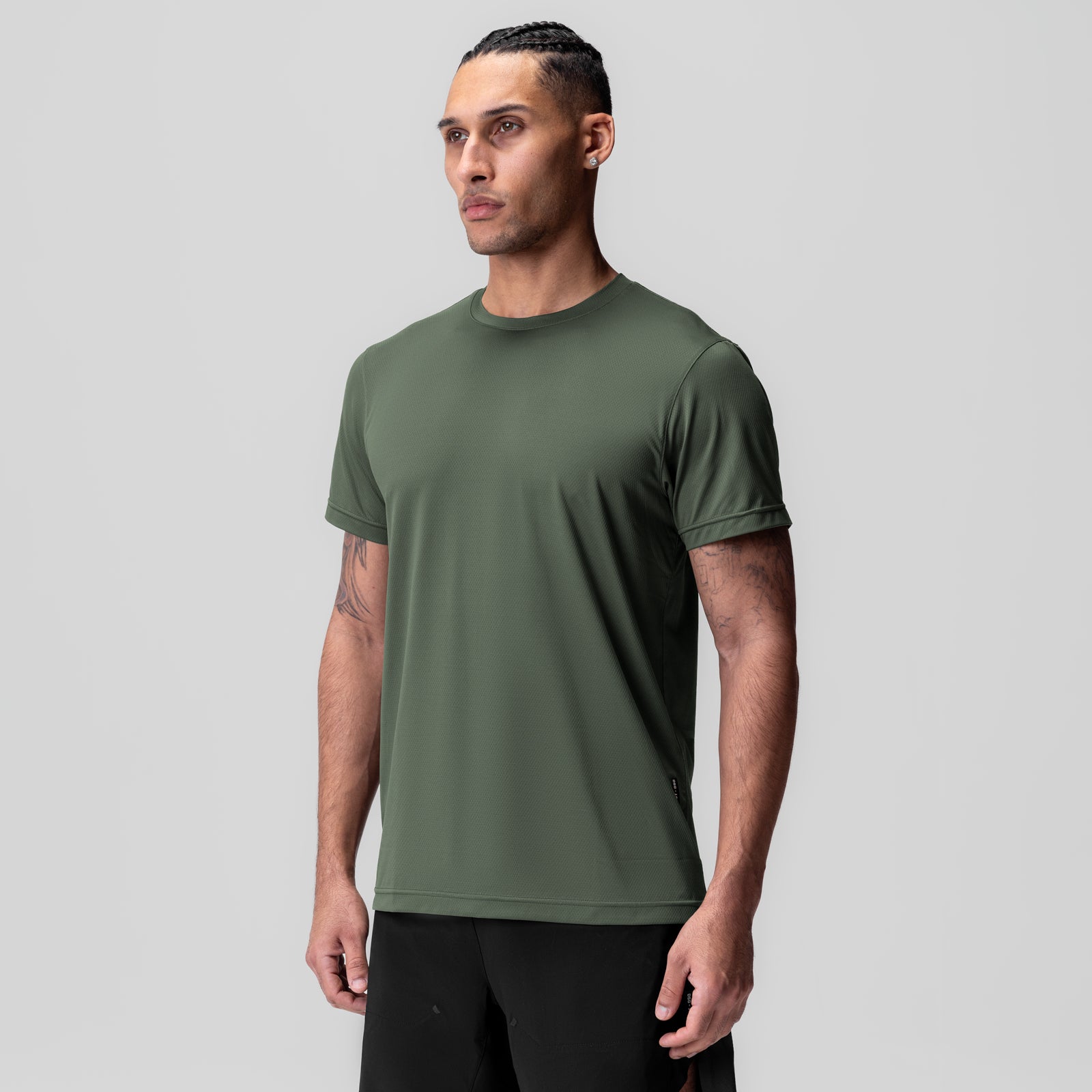 AeroSilver Essential Tee in olive green worn by male model, front view