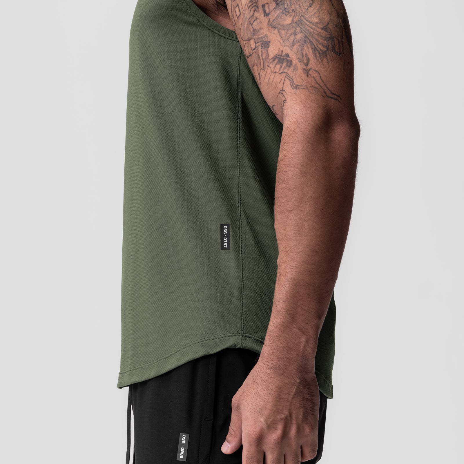 AeroSilver® Cutoff Tank in olive worn by model, side view