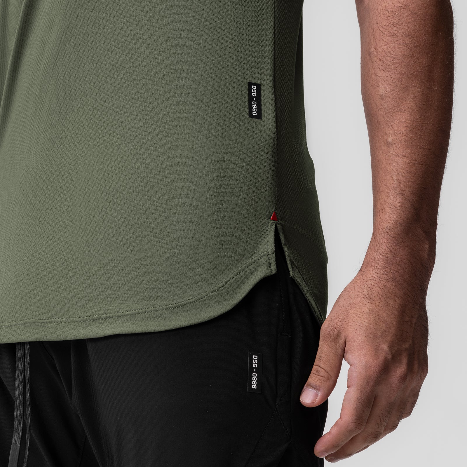 AeroSilver Established Tee in olive worn by model, side detail view