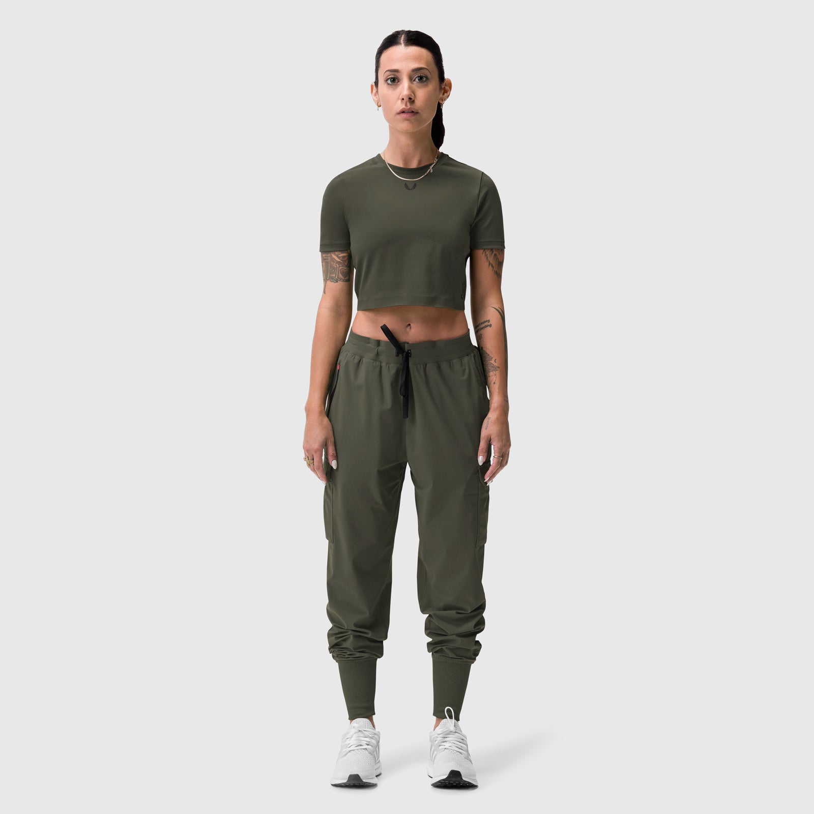 Olive cropped tee paired with olive cargo joggers, front view on model