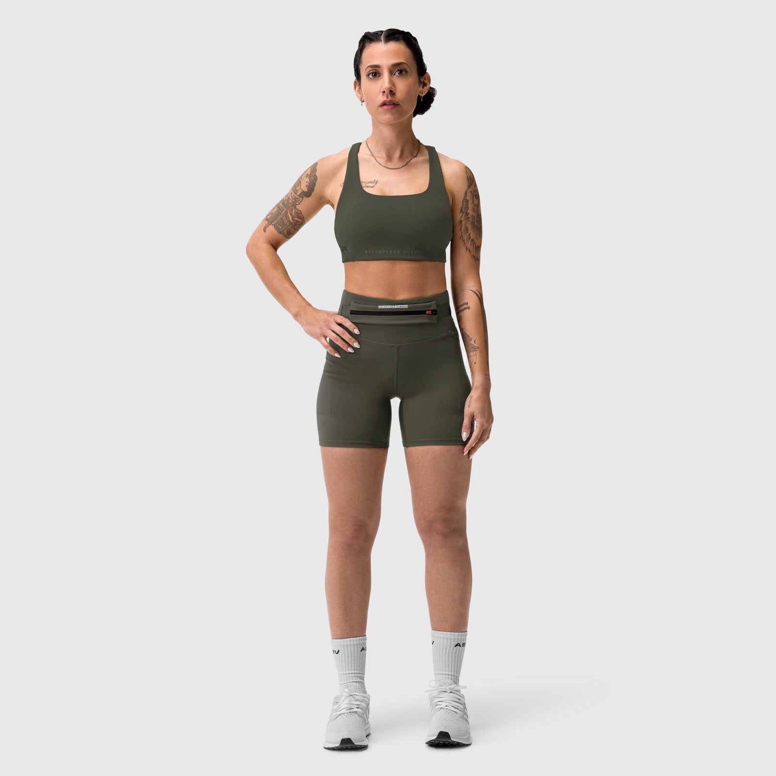 W029 Lycra 3-in-1 Biker Short in olive, worn with matching sports bra, front view