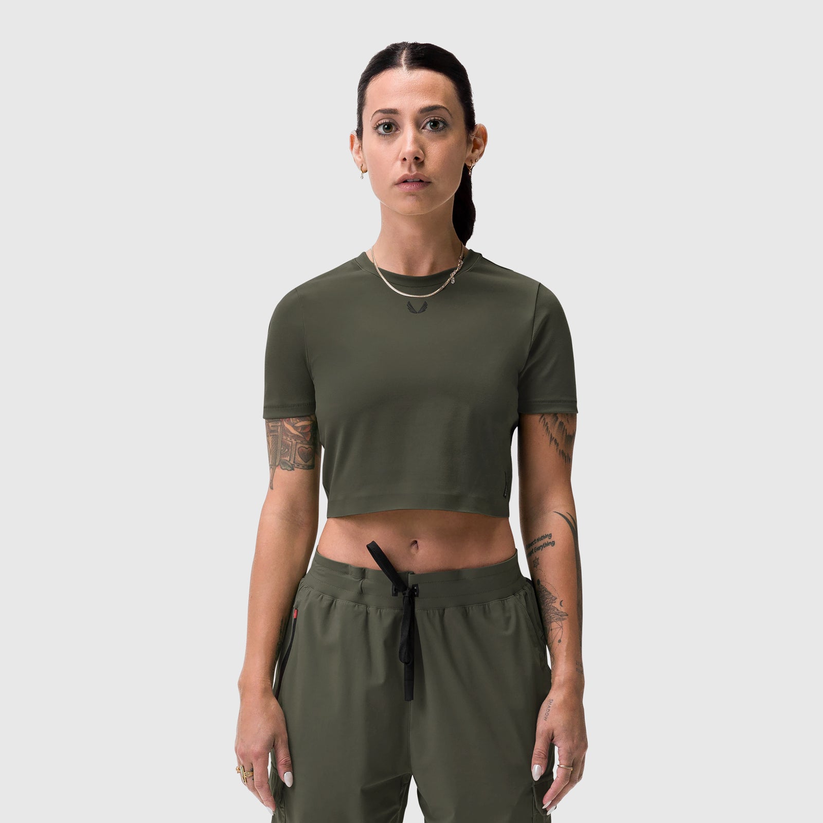 W019 Lycra Cropped Tee in olive, worn by model, front view