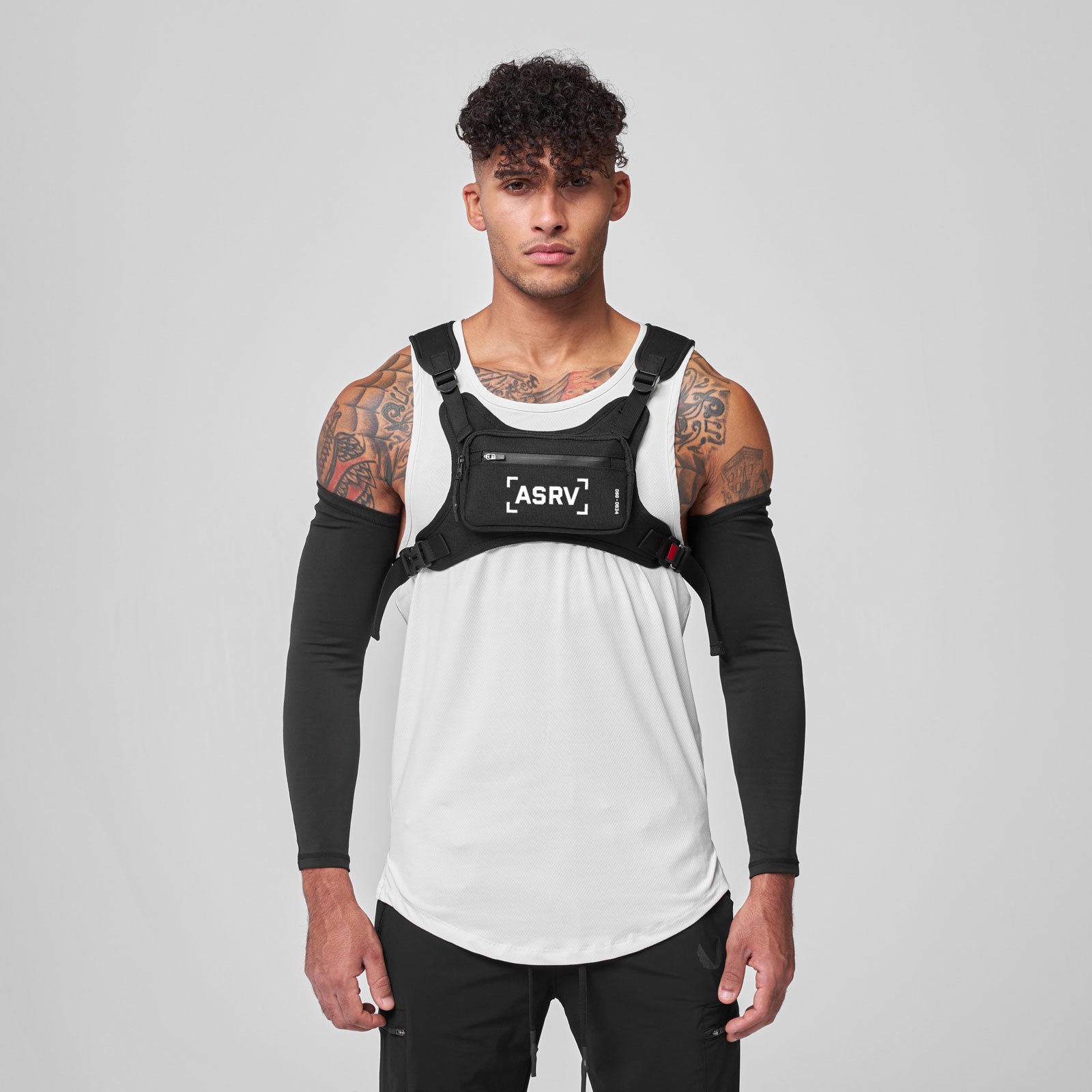0634 Waterproof Cordura® Conditioning Chest Pack in Black/White, worn by model
