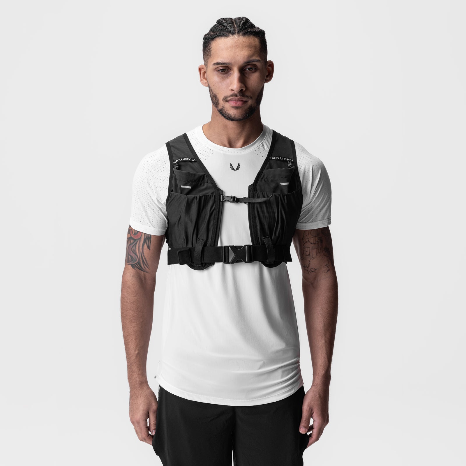 2-in-1 Packable Run Vest in black, front view on model