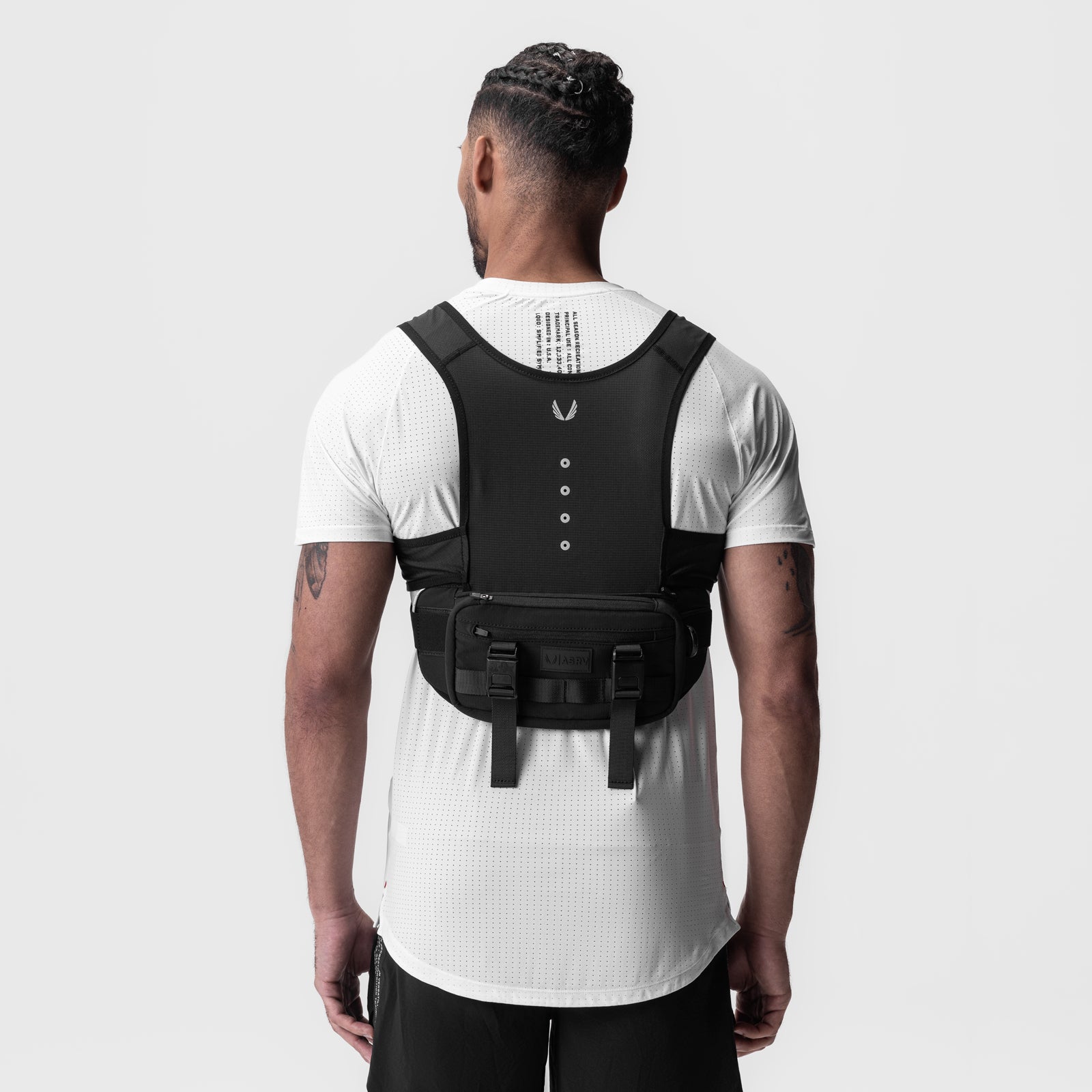 0899. 2-in-1 Packable Run Vest in Black, back view on model