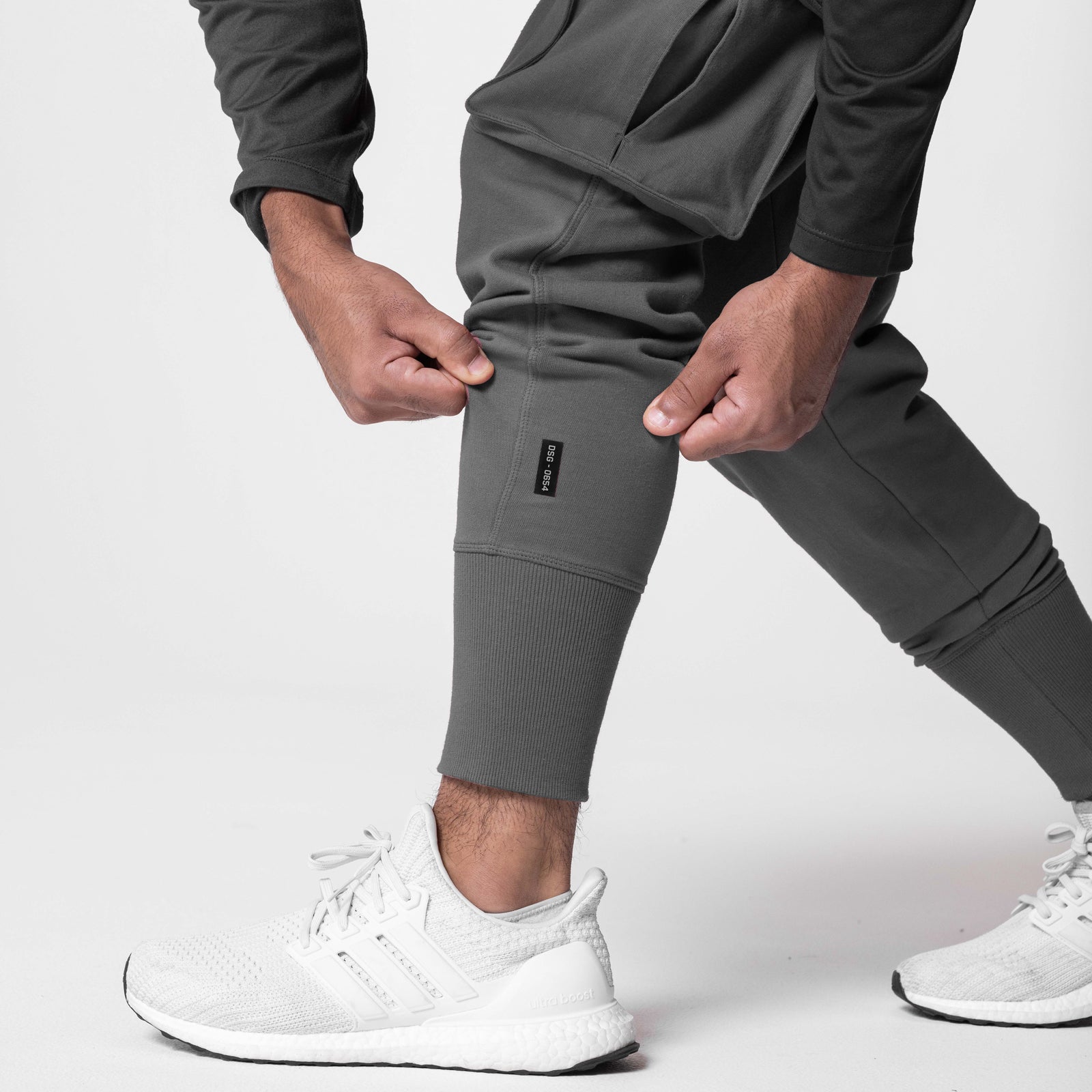 Tech-Terry Cargo High Rib Jogger in raven, worn by model with white sneakers