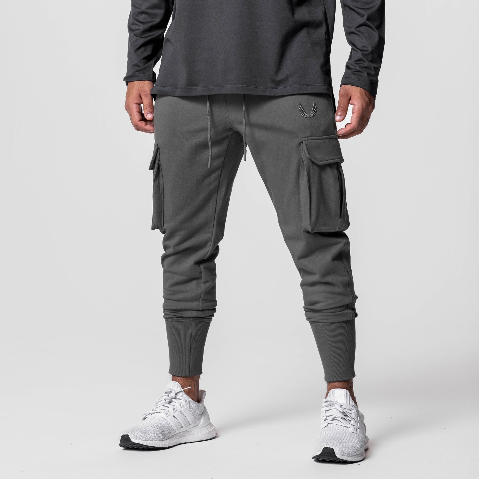 Tech-Terry Cargo High Rib Jogger in raven, worn by model with white sneakers