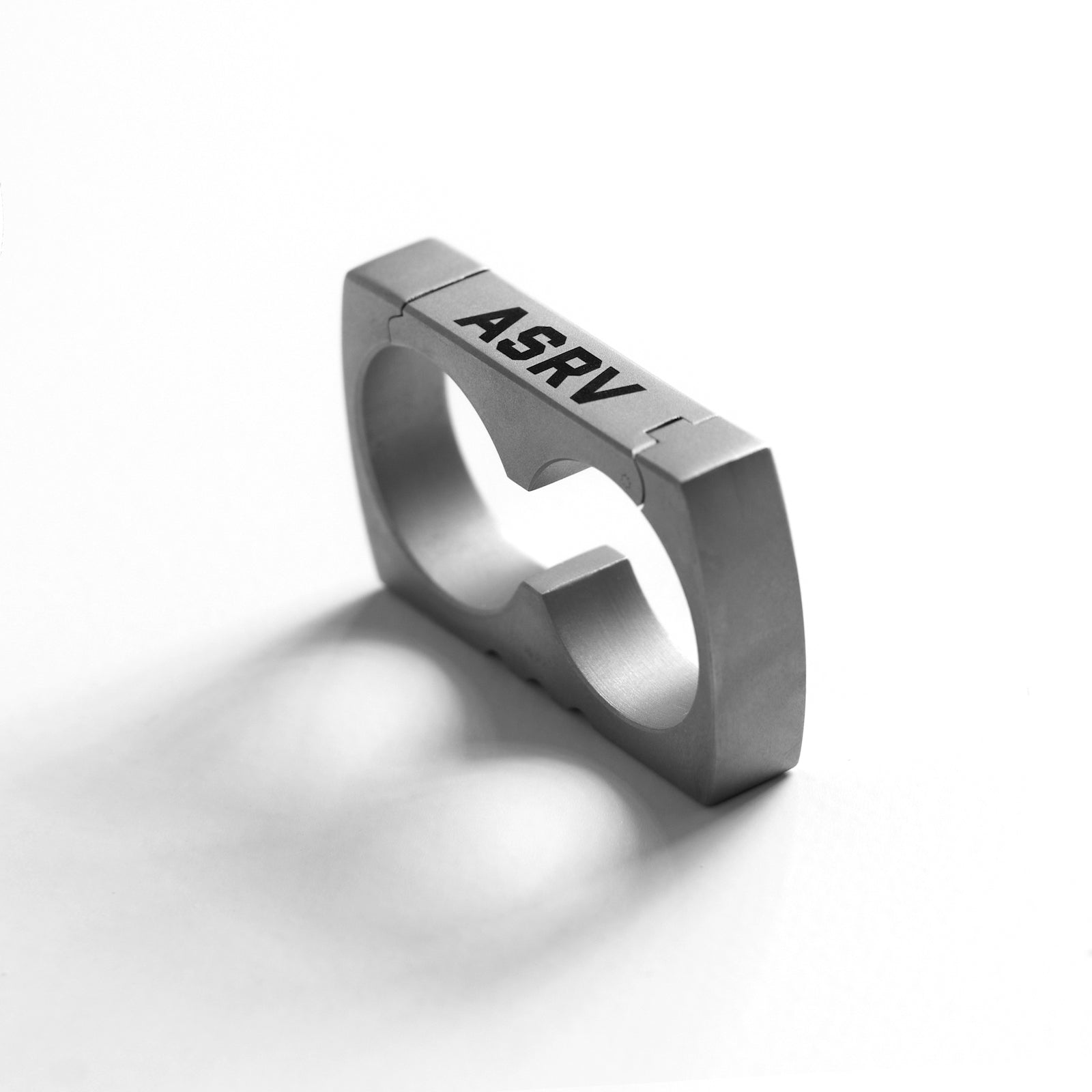 Flatlay of ASRV Carabiner Double Ring in stainless steel, angled view