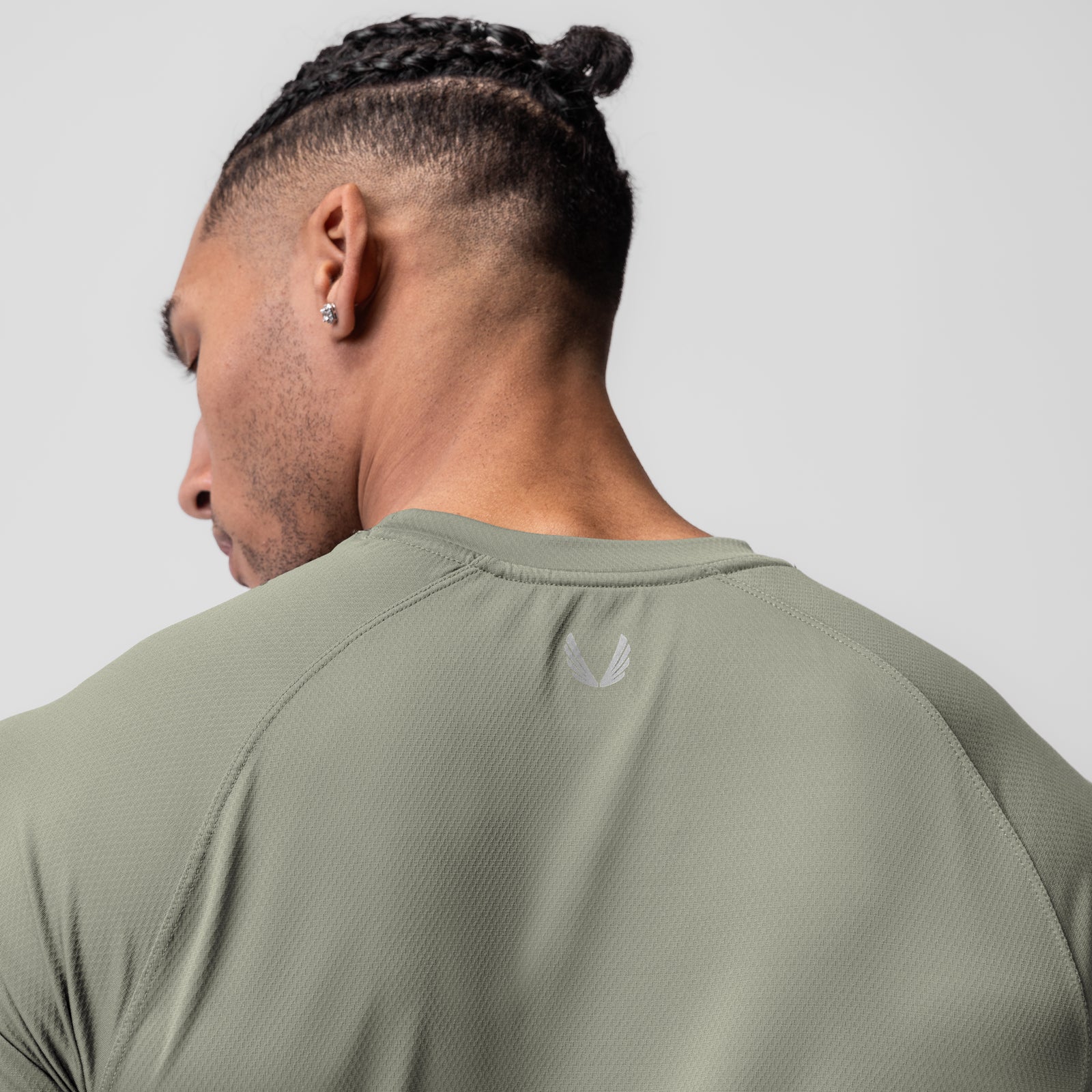 AeroSilver Established Tee in sage, back view on model
