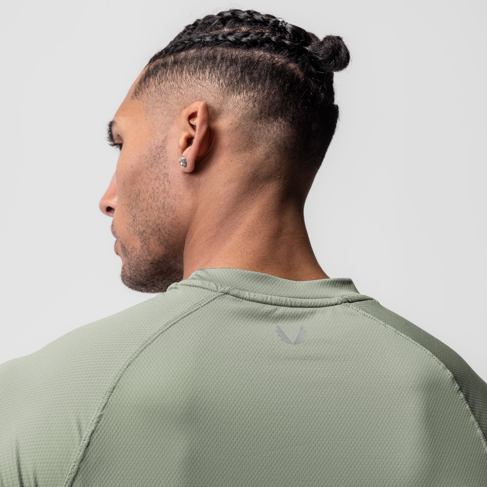 AeroSilver® Fitted Tee in sage worn by model, side profile view