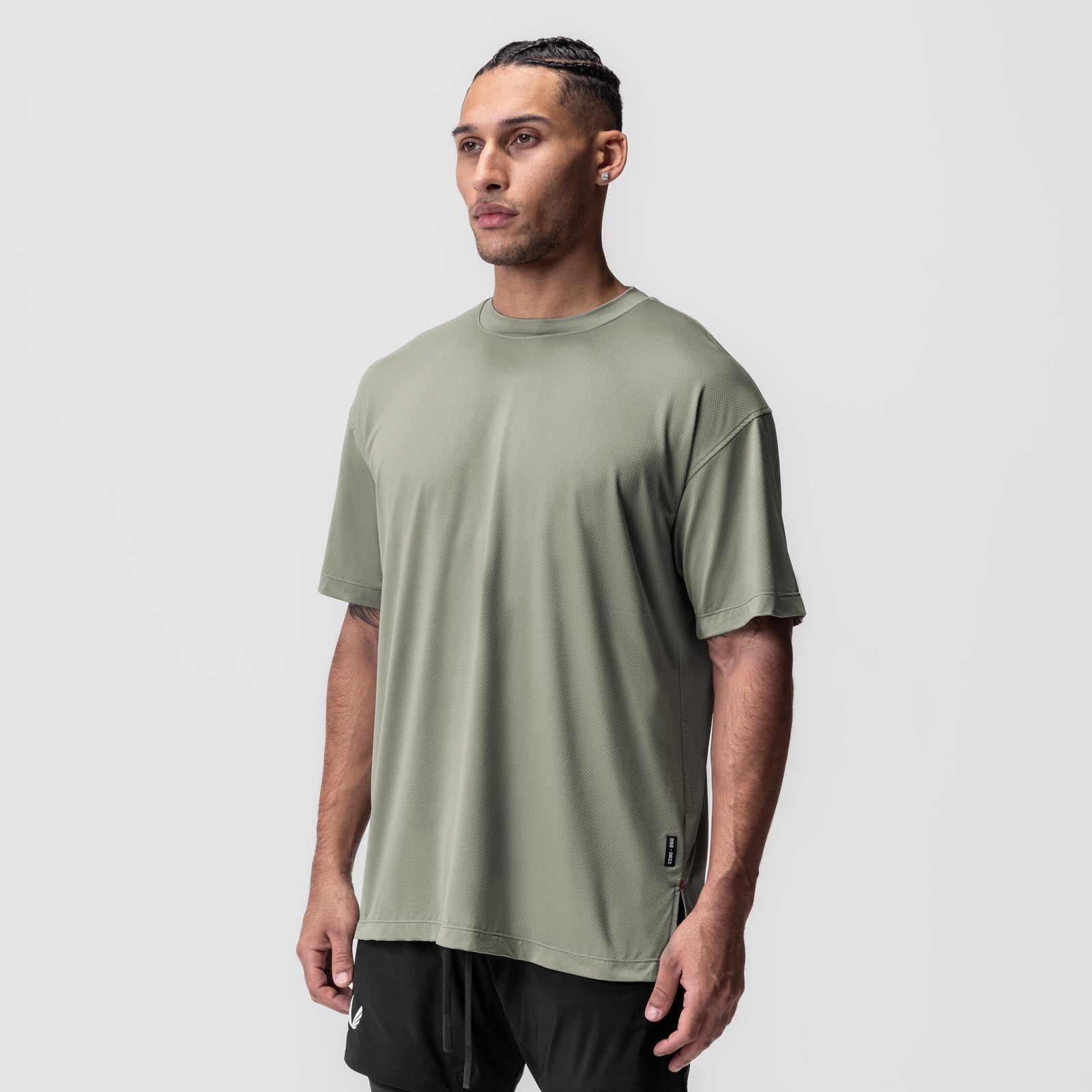 AeroSilver Oversized Tee in sage, worn by model, front view