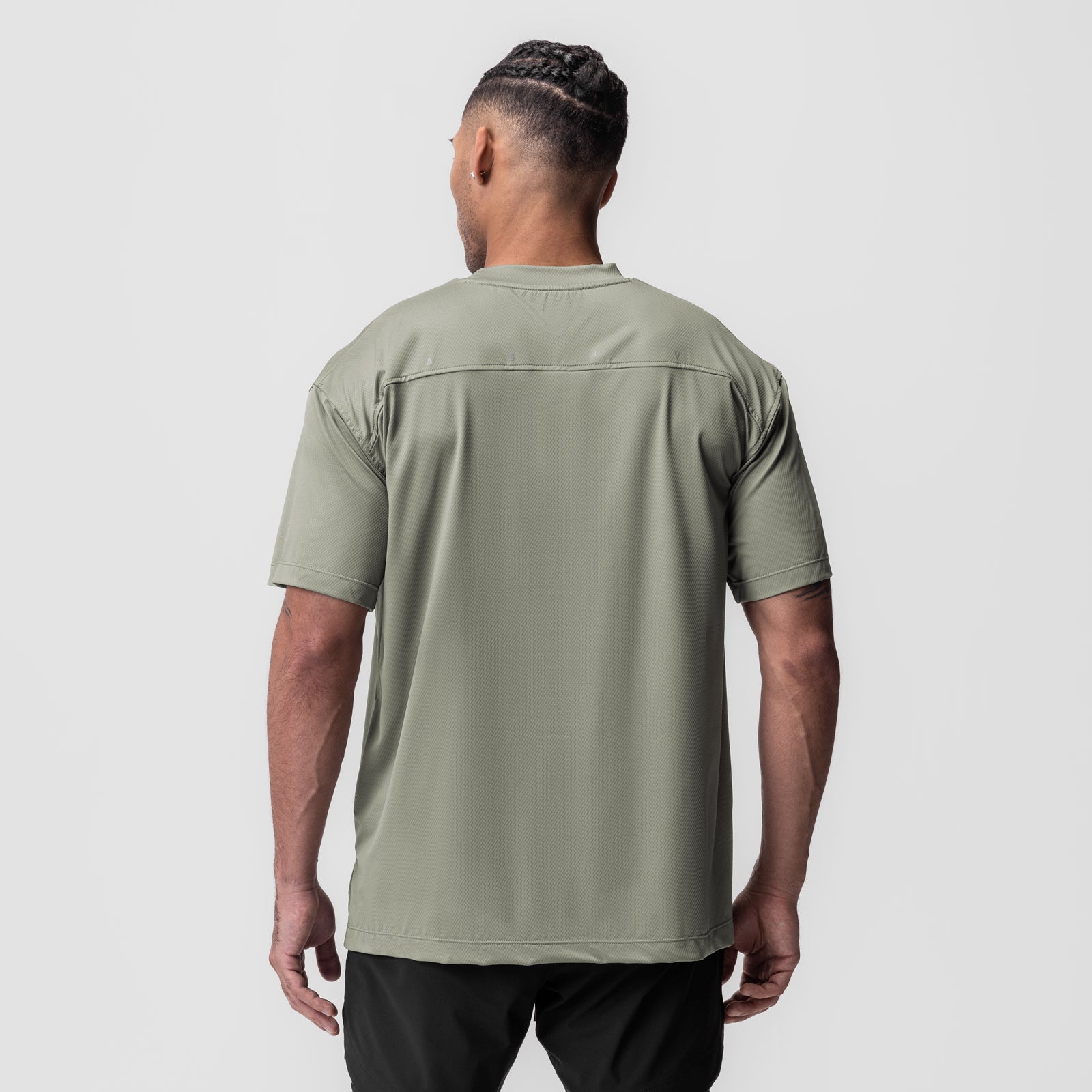 AeroSilver Oversized Tee in sage, worn by model, back view