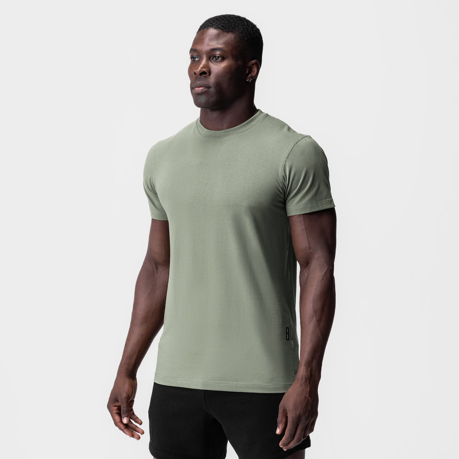 Supima Essential Tee in sage green, worn by model in front view