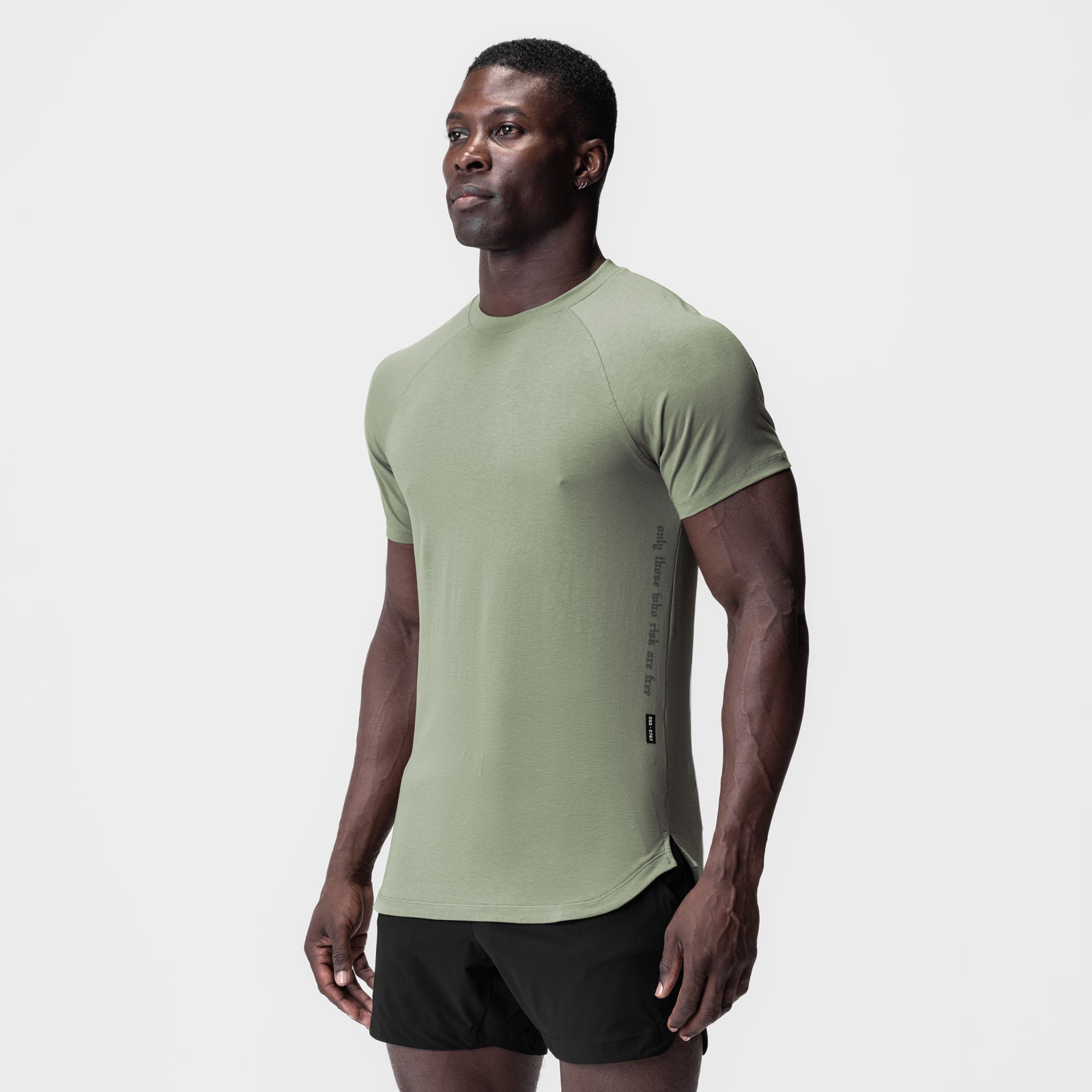Sage green Supima Established Tee worn by model, side view