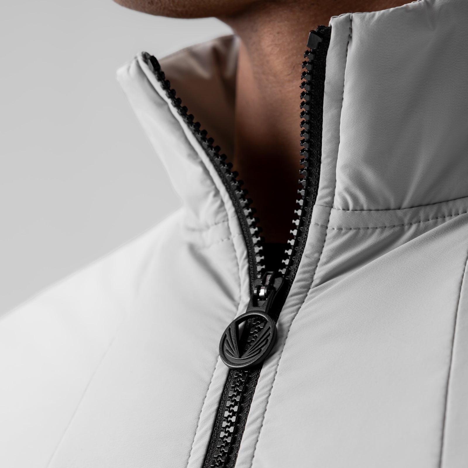 Aerotex™ PrimaLoft® Quarter Zip in Slate Grey, closeup of zipper detail on model