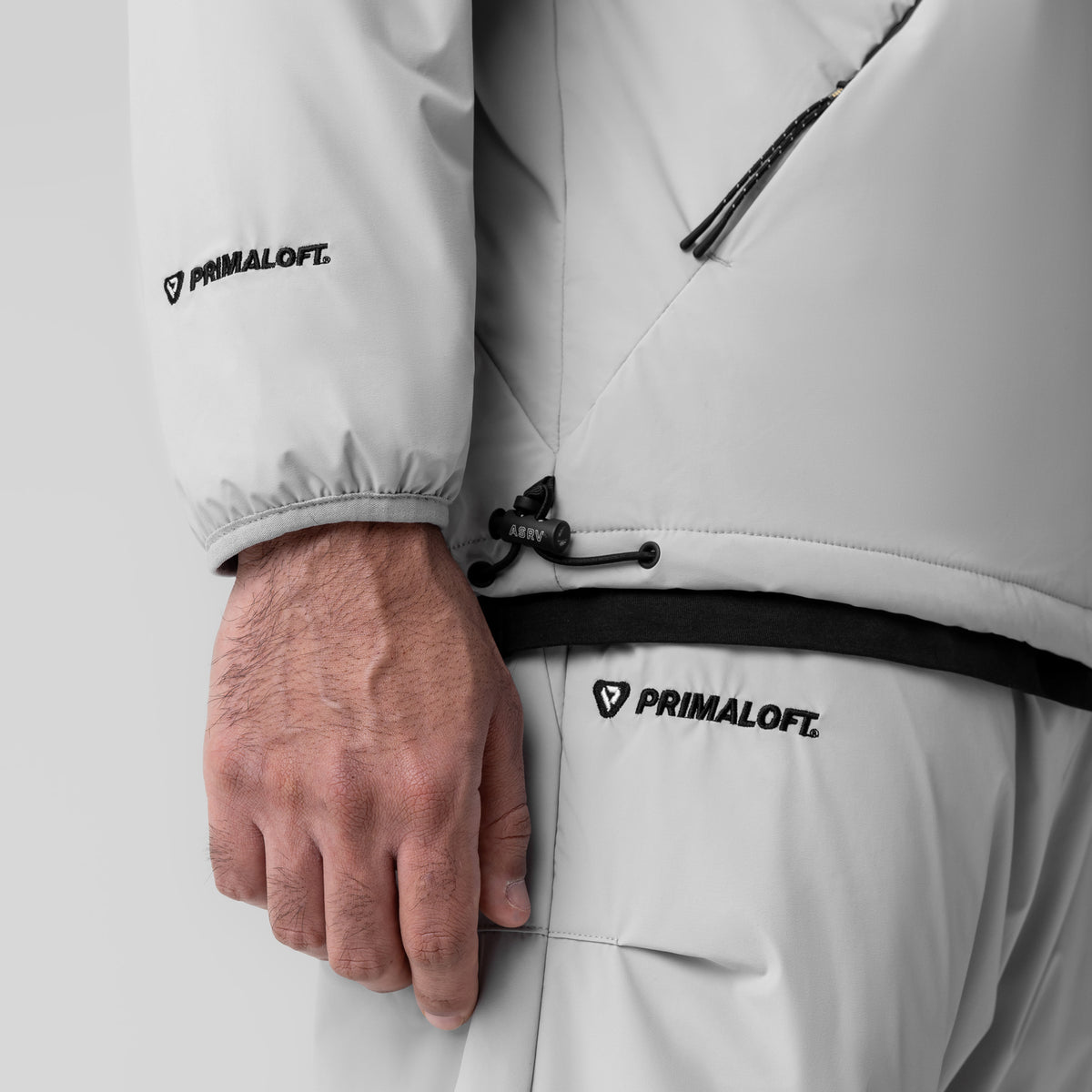Aerotex™ PrimaLoft® Quarter Zip in Slate Grey, detail shot of model wearing jacket