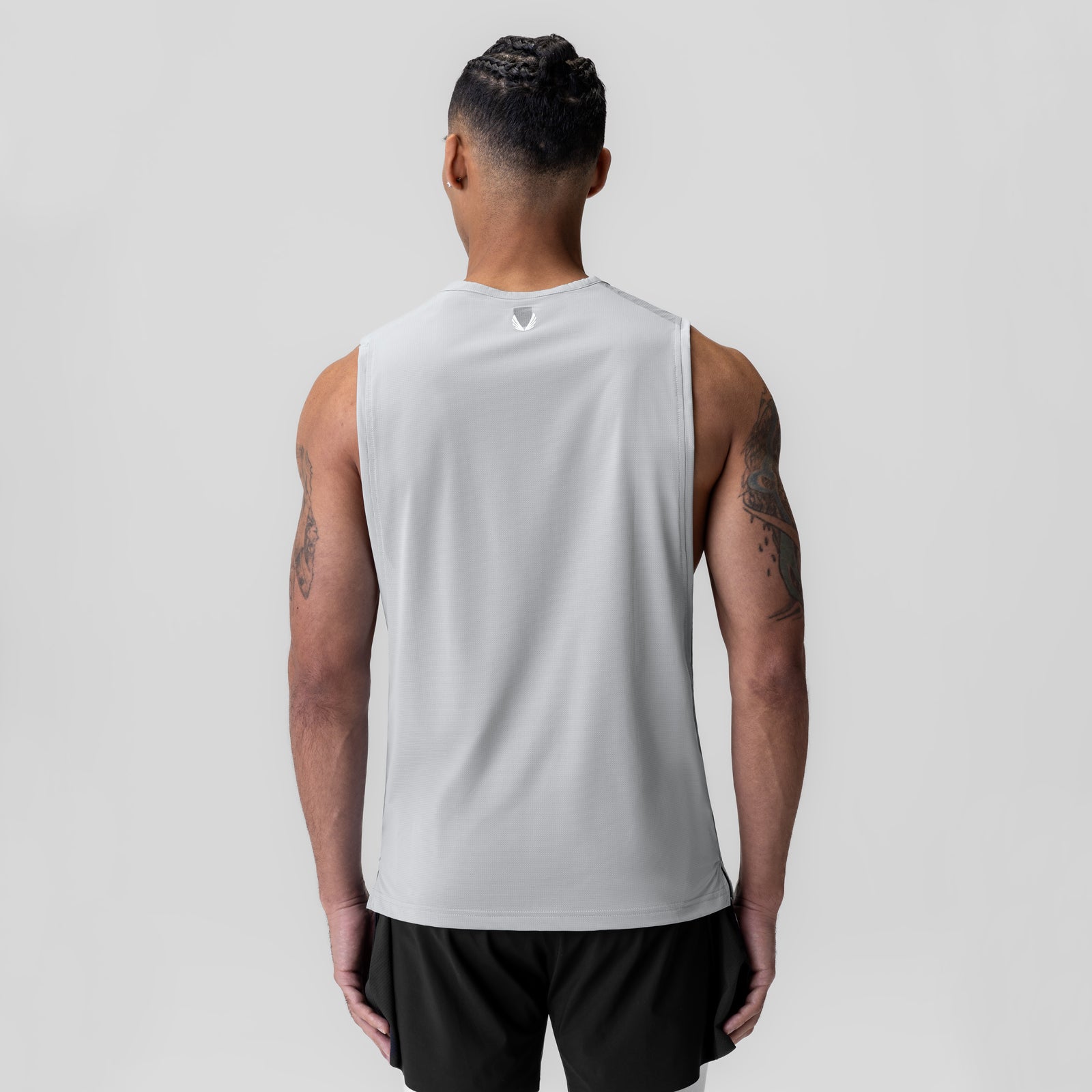 Ice-Skin™ Muscle Tank in white, back view on model