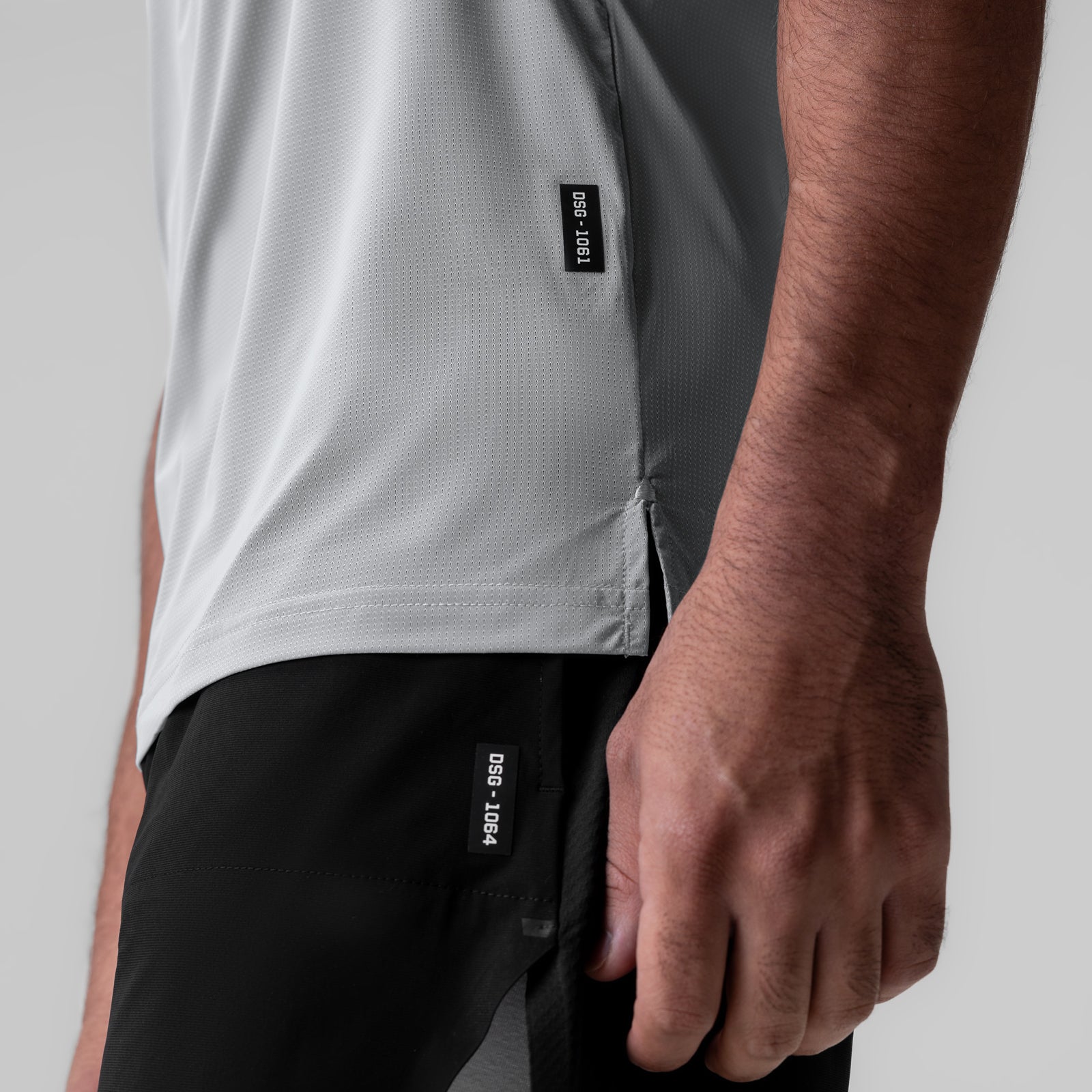Ice-Skin Muscle Tank in Slate Grey, worn by model showing side view and fit