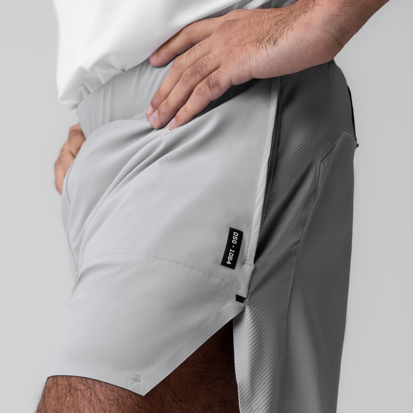 Tetra-Lite 6" Bonded Training Short in Slate Grey, worn by model showing side pocket detail