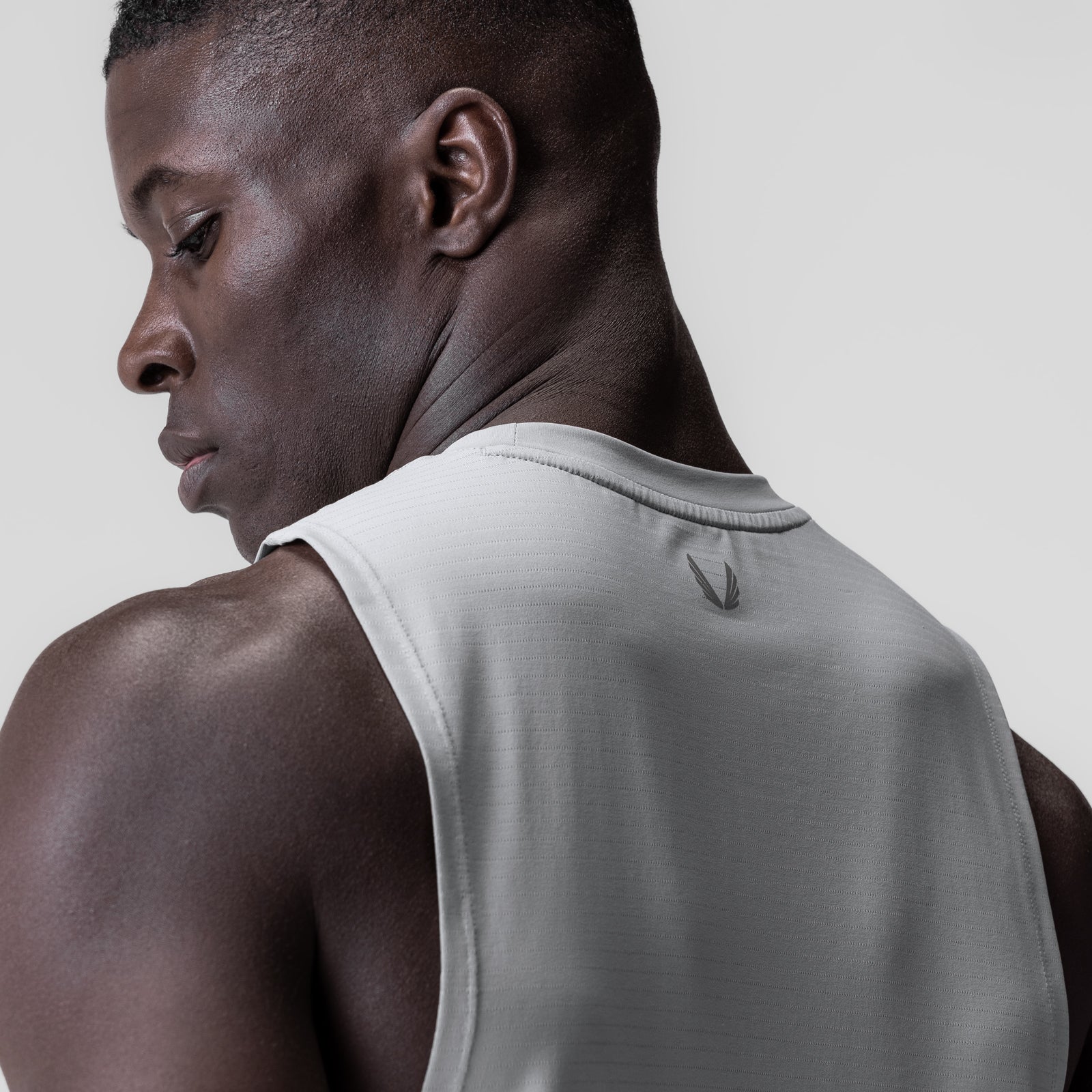3D-Lite® 2.0 Lycra® Muscle Tank in Slate Grey, model wearing tank from back angle