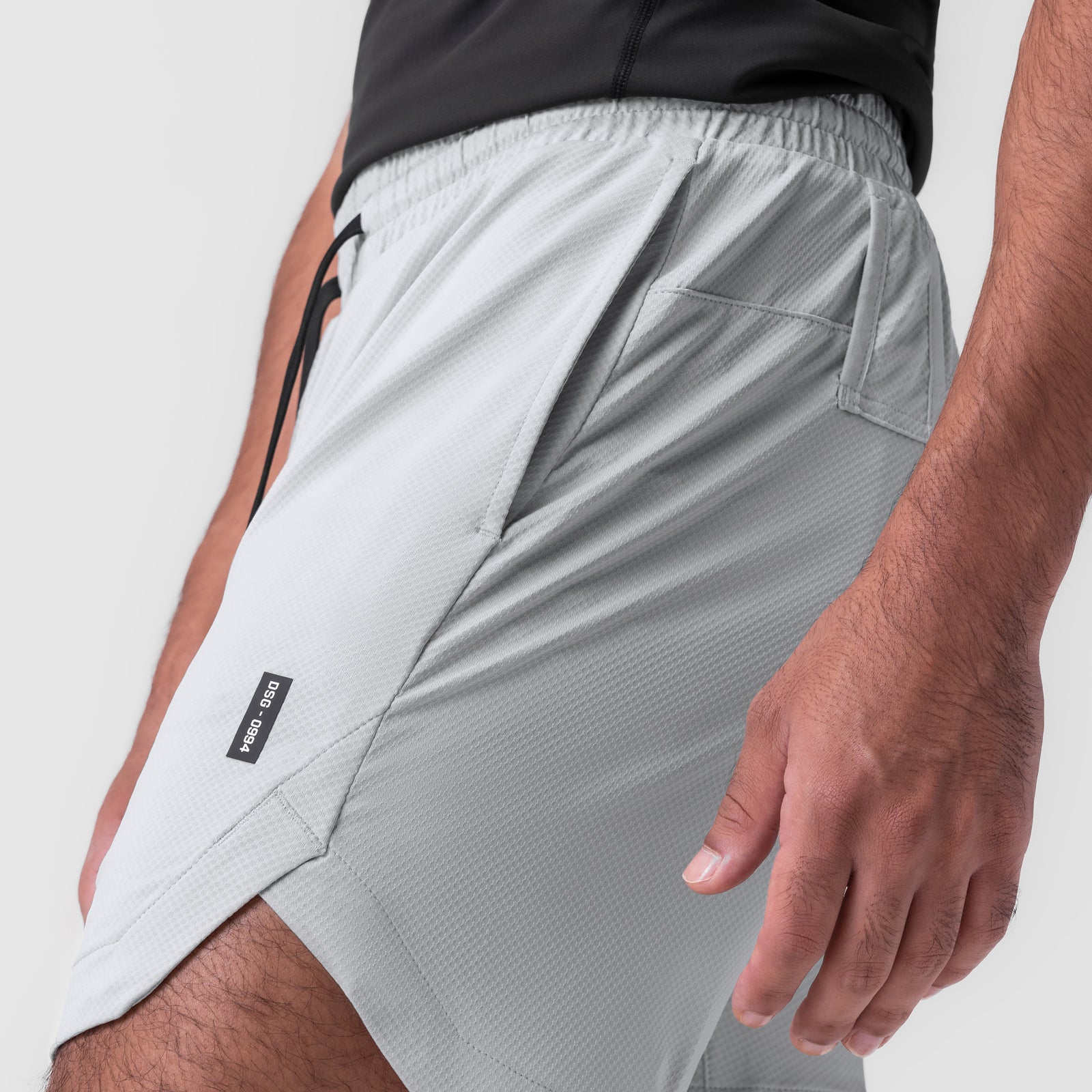 AeroSilver® 7" Linerless Short in Slate Grey, worn by model, side view