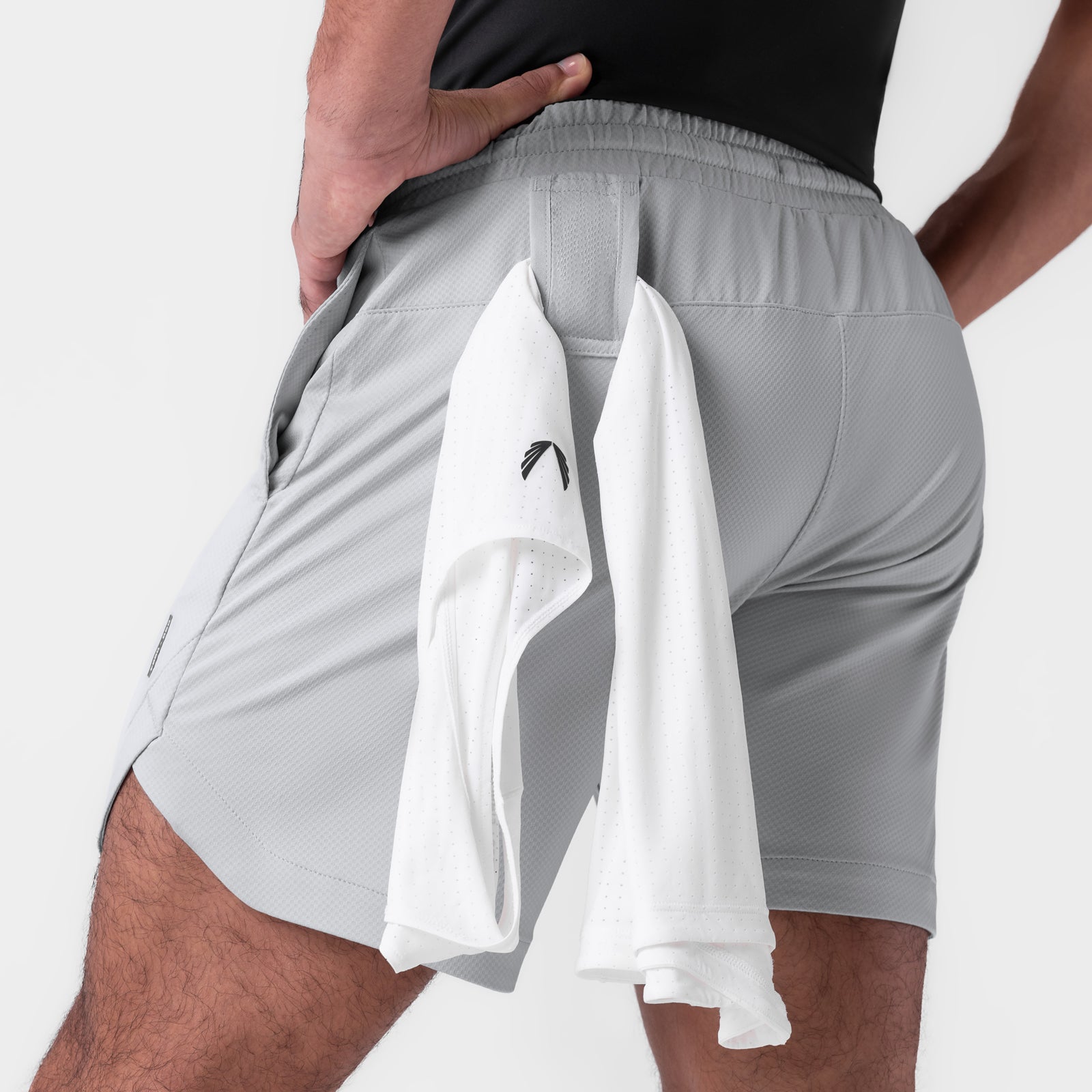 AeroSilver 7" Linerless Short in Slate Grey worn by model, back view with towel