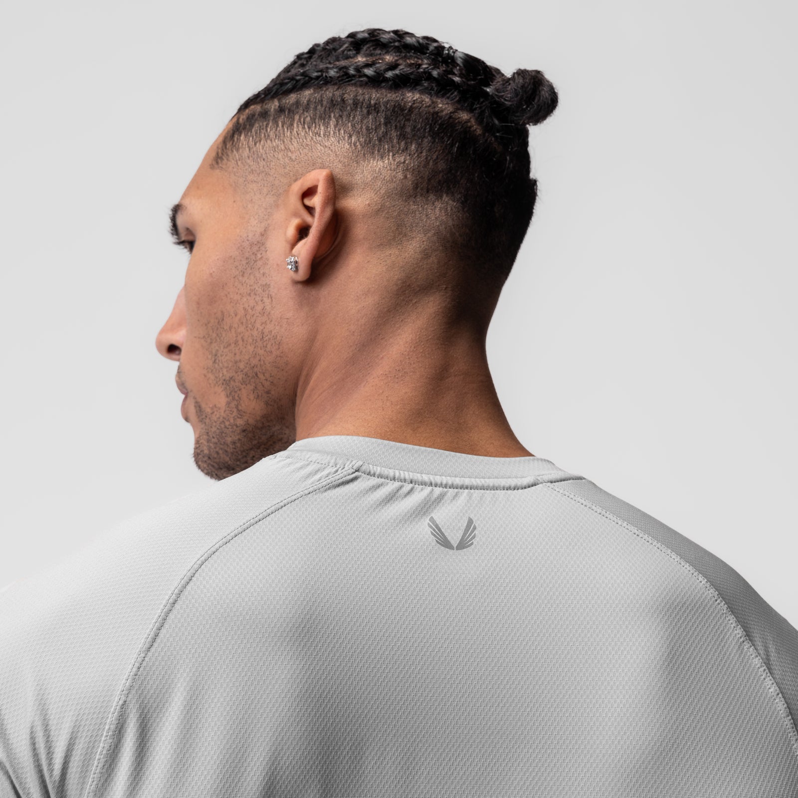 AeroSilver Established Tee in Slate Grey, worn by model, back view