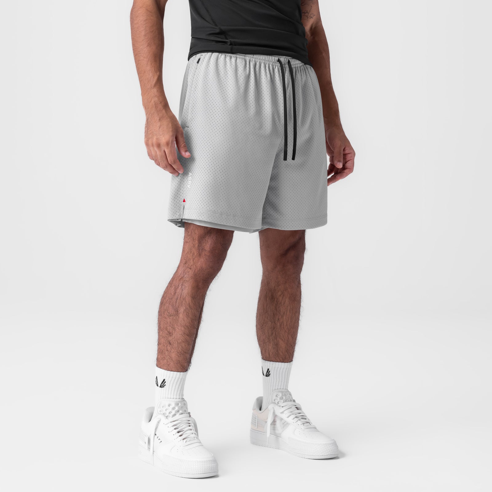 Reversible 2-in-1 short in slate grey worn by model, front view