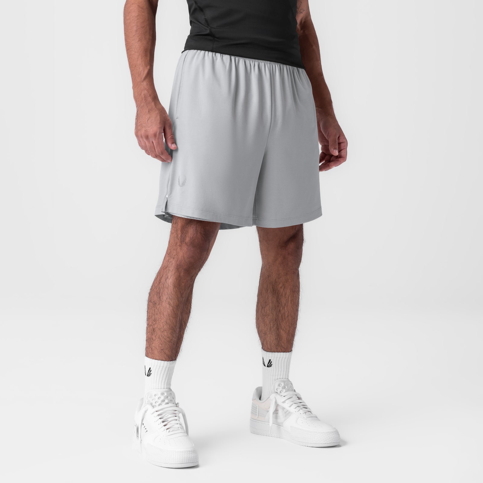 Reversible 2-in-1 Short in Slate Grey worn by model with white sneakers, front view