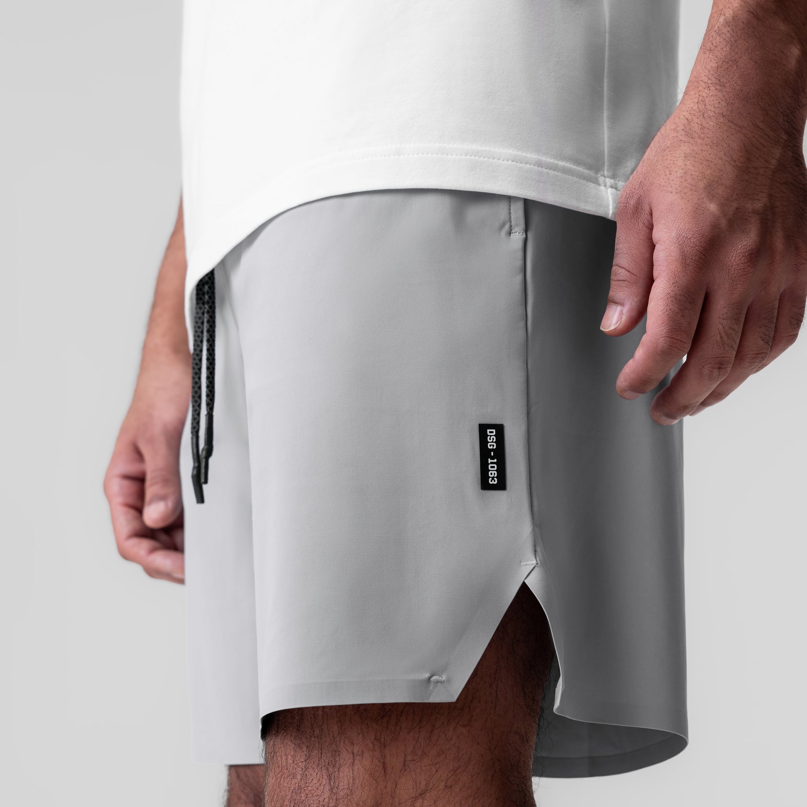 Revolutional Field Short in slate grey, modeled on person showing fit and drawstring detail