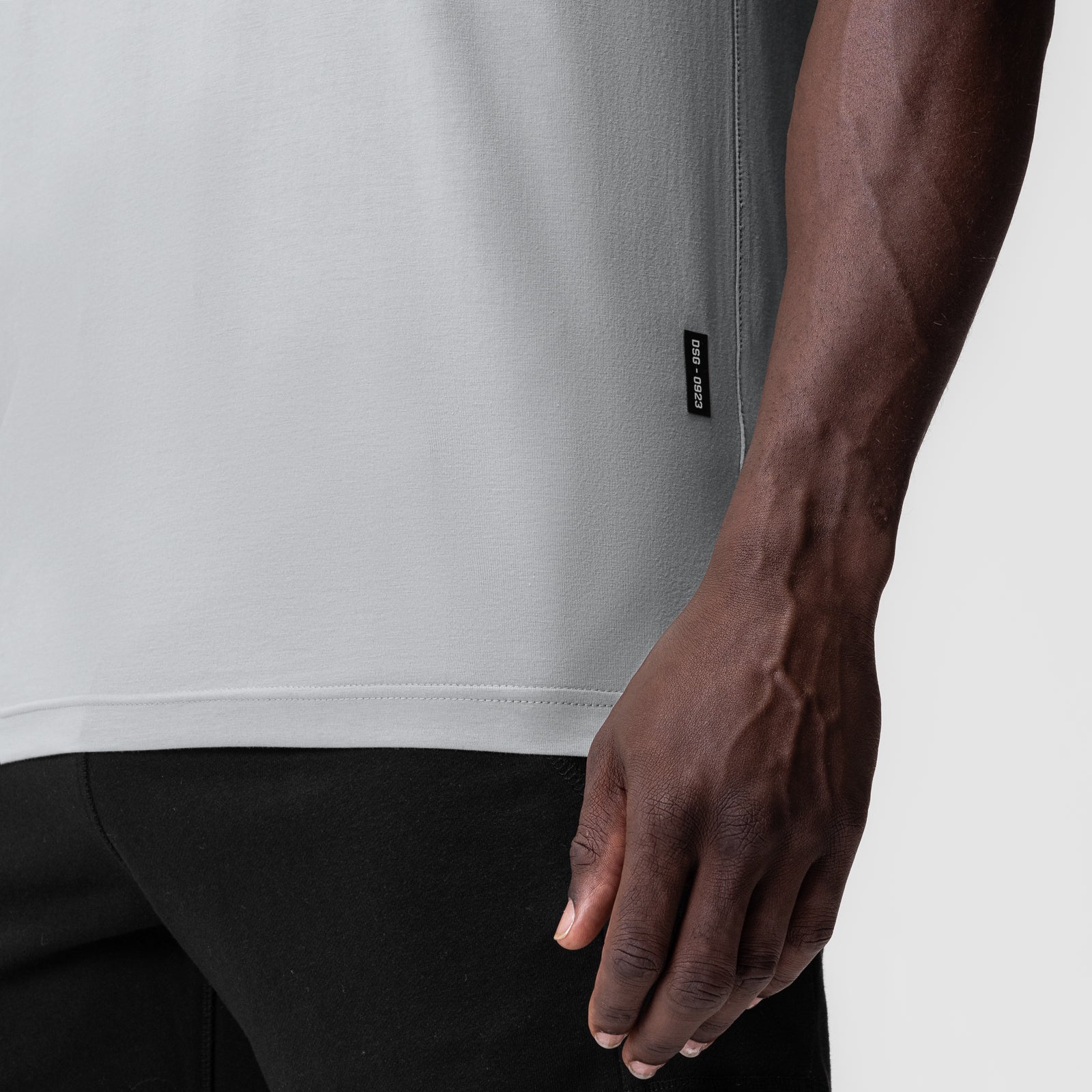 Supima Essential Tee in Slate Grey worn by model, side view showing fit and fabric detail