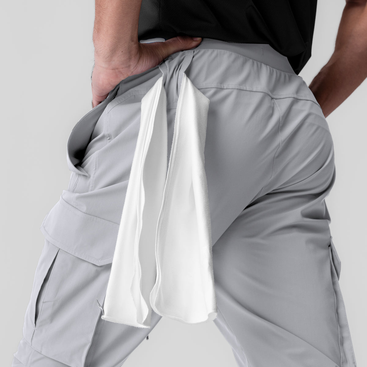 Tetra-Lite Ice Cargo jogger in slate grey worn by model, side view showing cargo pocket detail