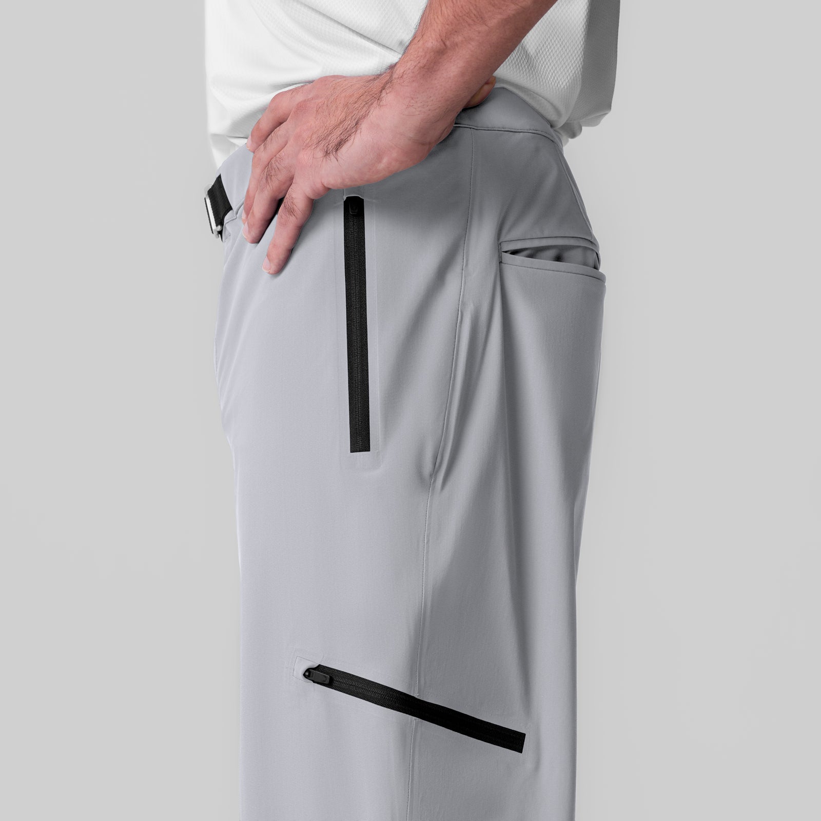 Tetra-Lite® Field Pant in Slate Grey worn by model, side view showing zip pockets
