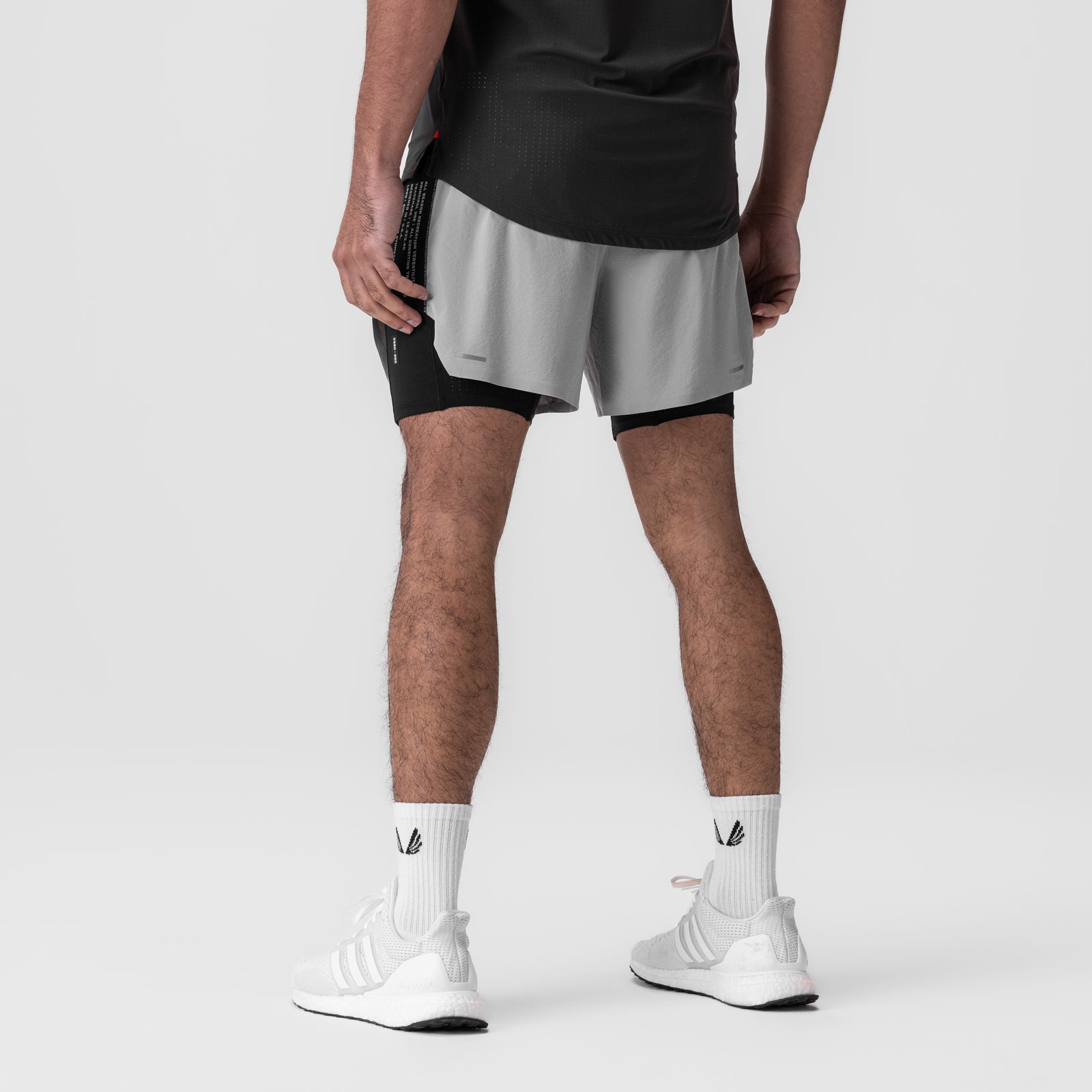 Aerotex Hybrid Liner Short in slate grey and black, worn by model, front view