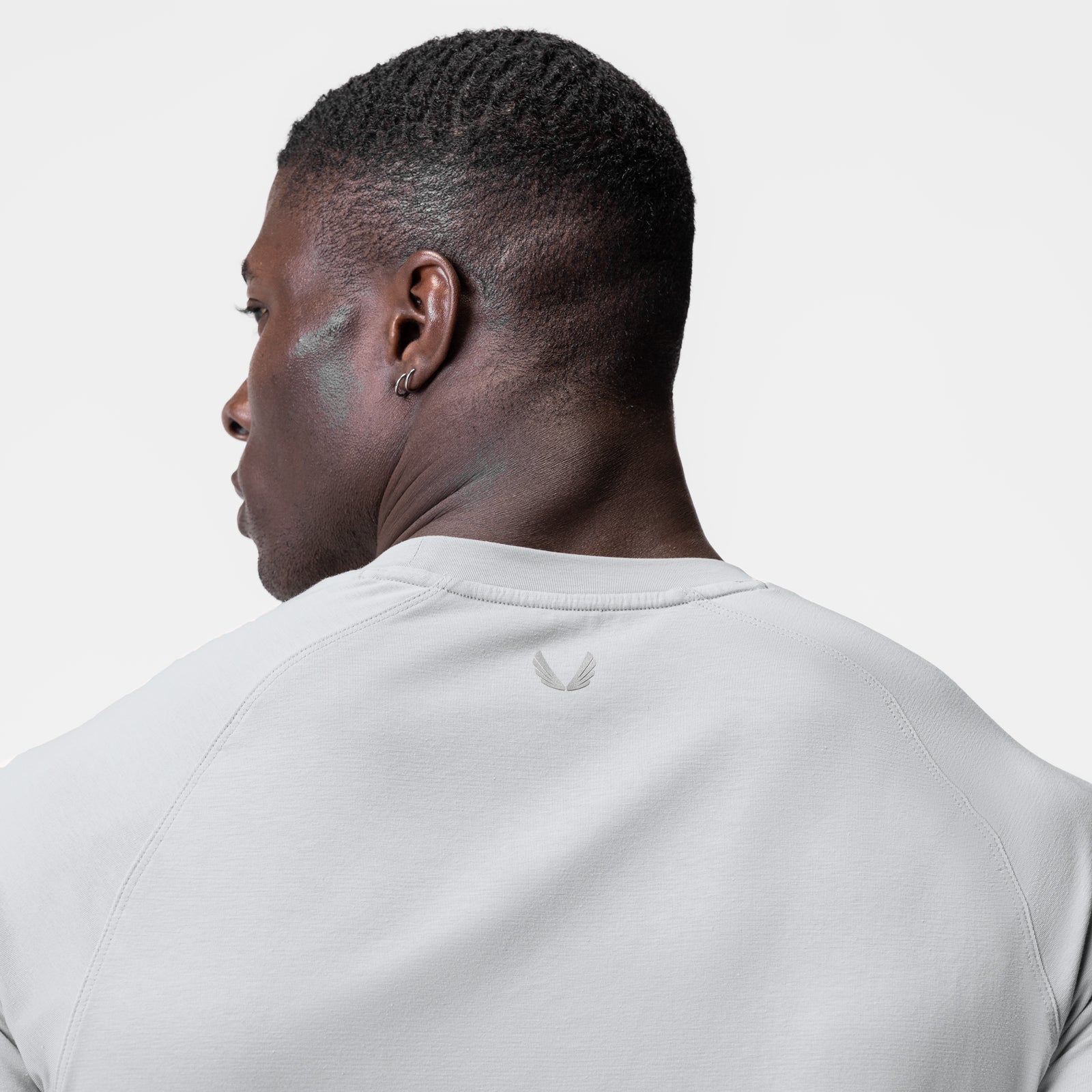 Supima® Established Tee in light grey, worn by model shown from behind