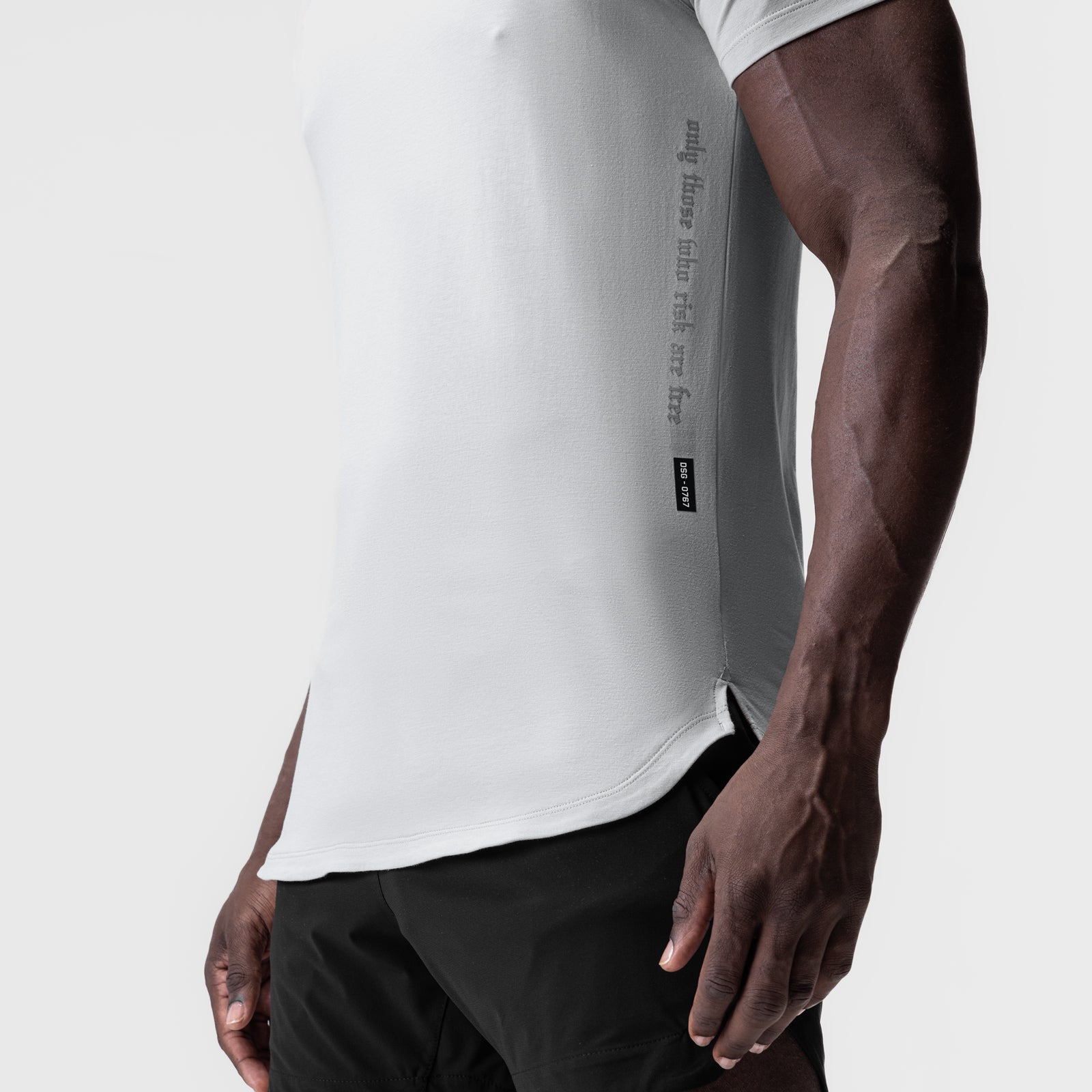 Supima® Established Tee in white, worn by model showing side profile and fit