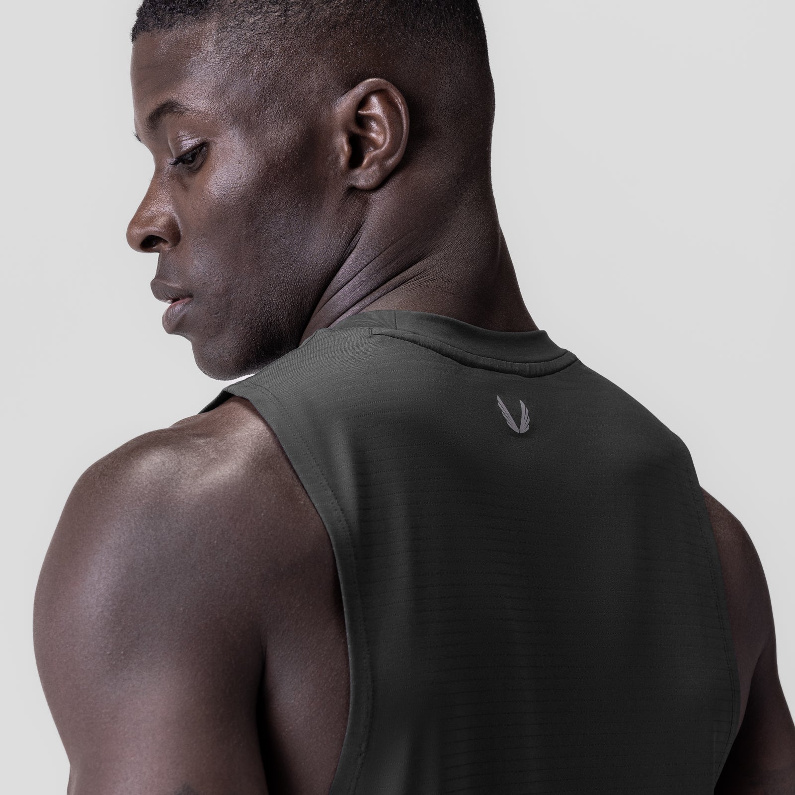 3D-Lite® 2.0 Lycra® Muscle Tank in Space Grey, worn by model in profile view