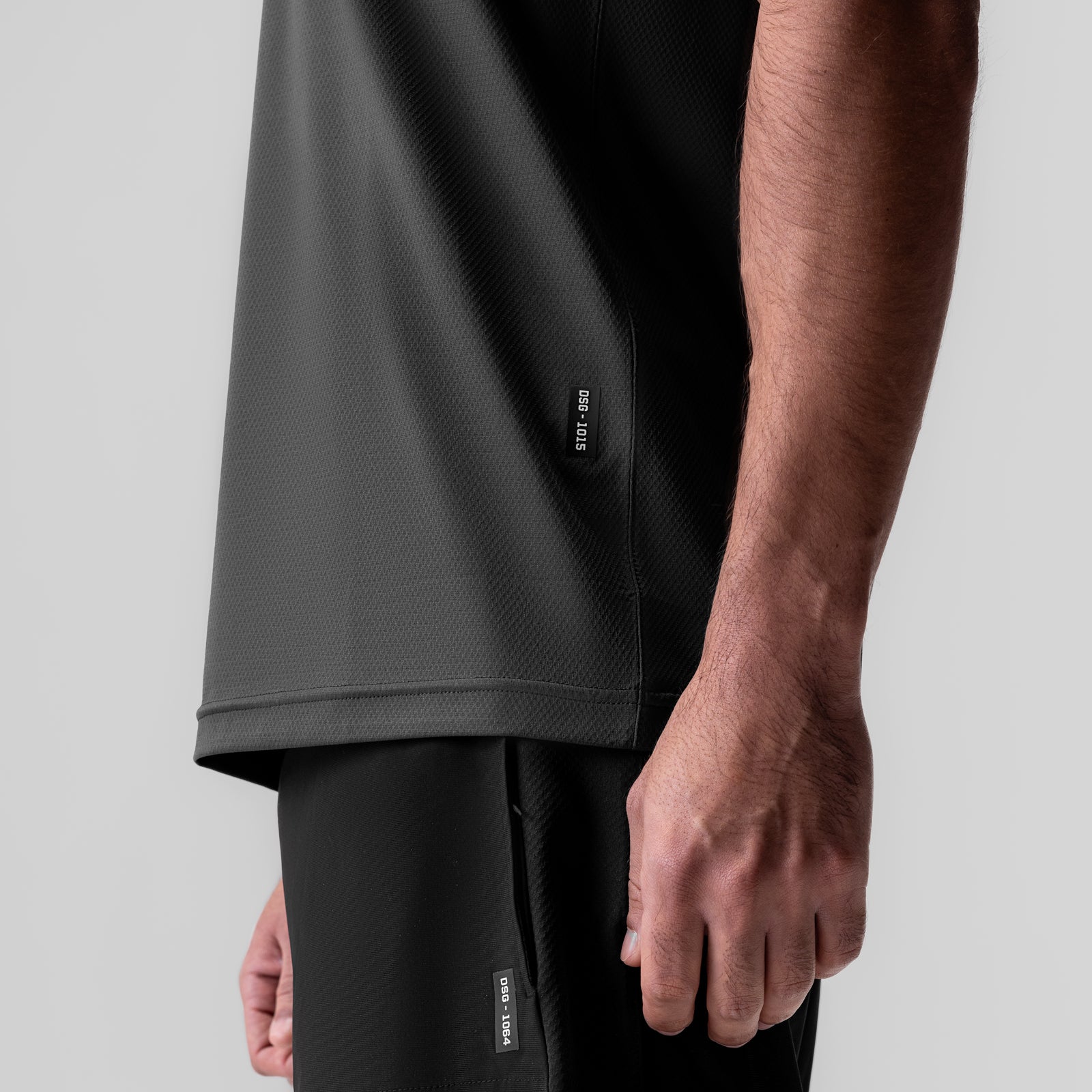 ASRV AeroSilver Essential Tee in Space Grey, worn by model, side view