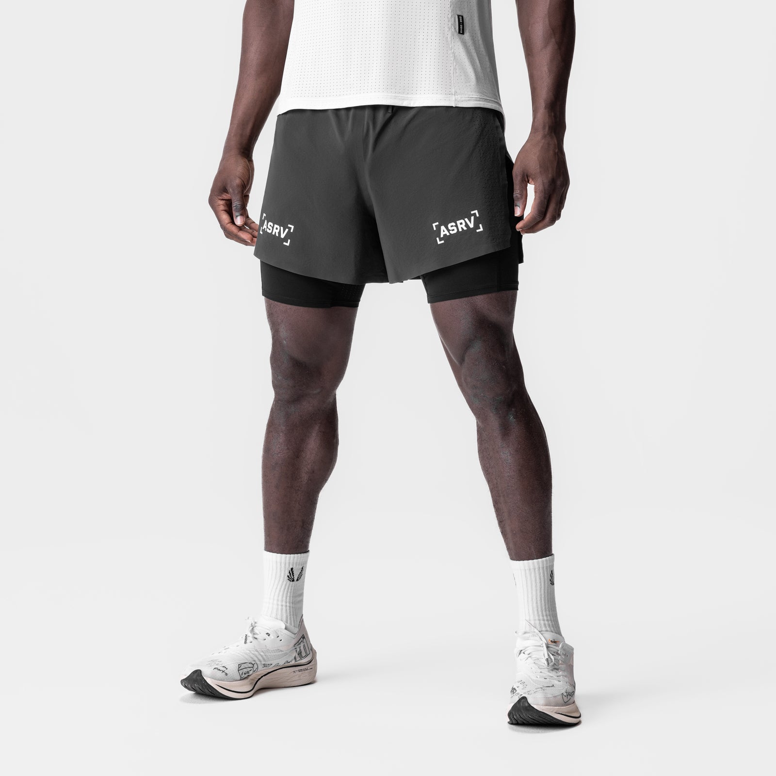 Aerotex 4" High Split Liner Short in Space Grey, worn by model from waist down
