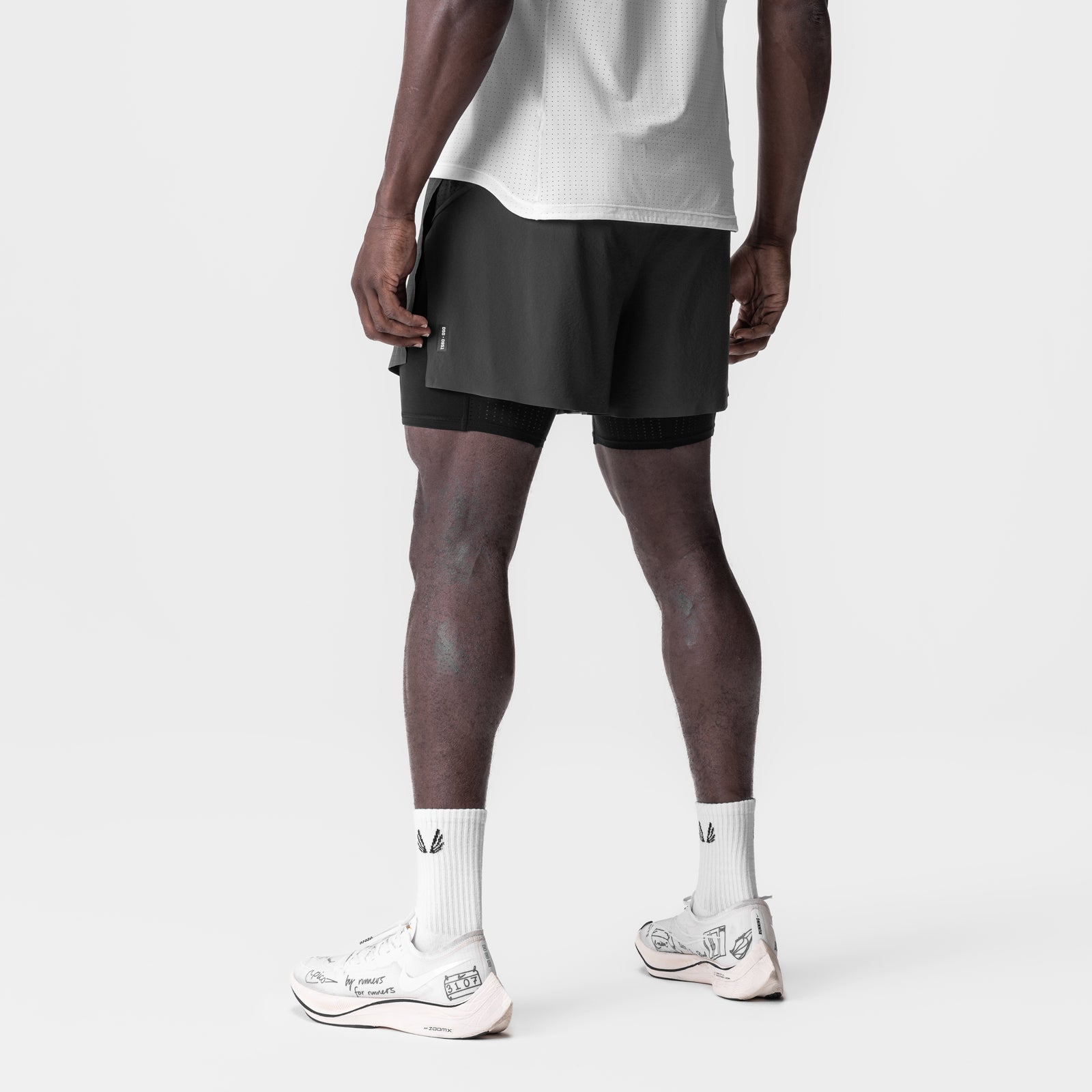 Aerotex 4" High Split Liner Short in Space Grey, worn by model, back view
