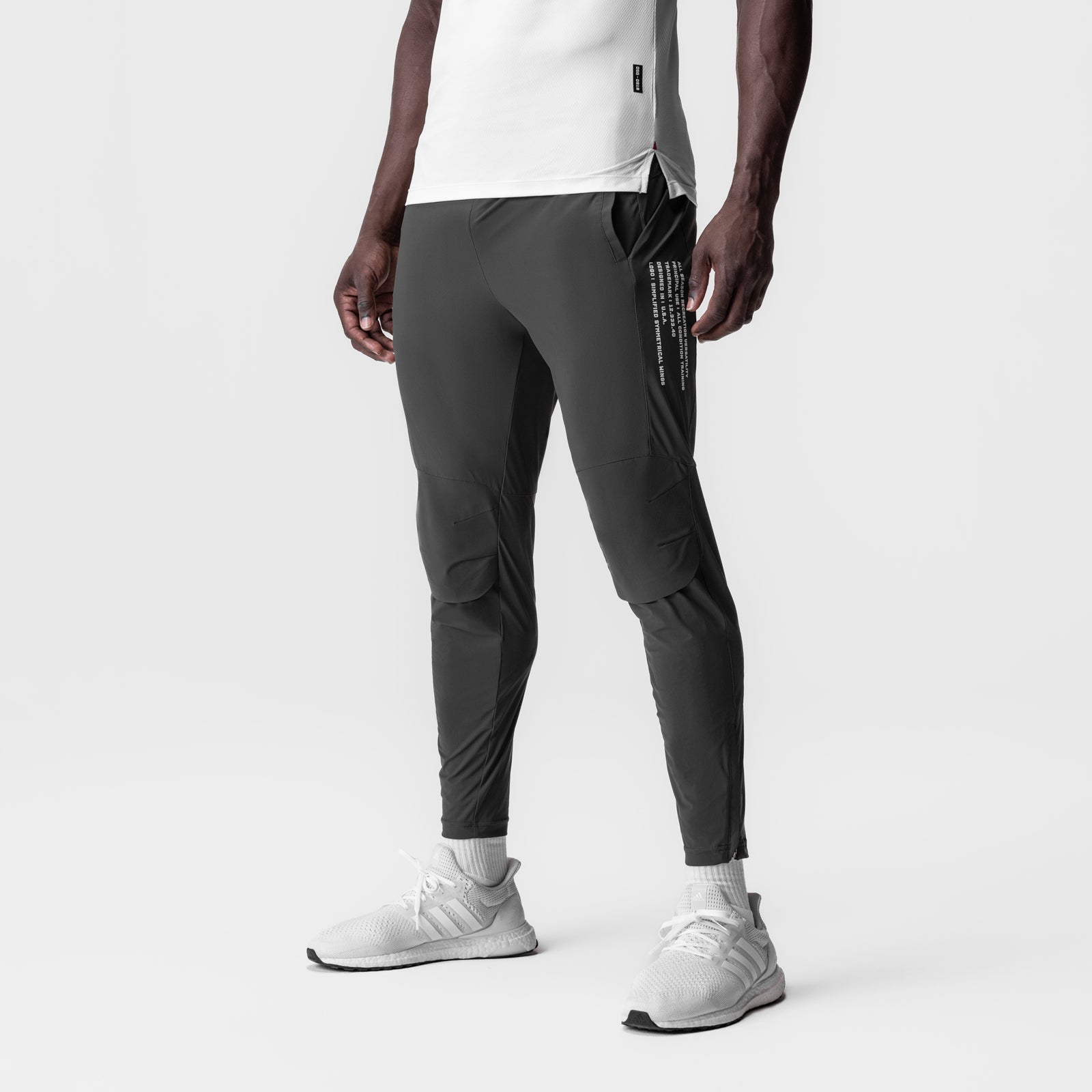 Tetra-Lite Moto Jogger in space grey worn by model, side view