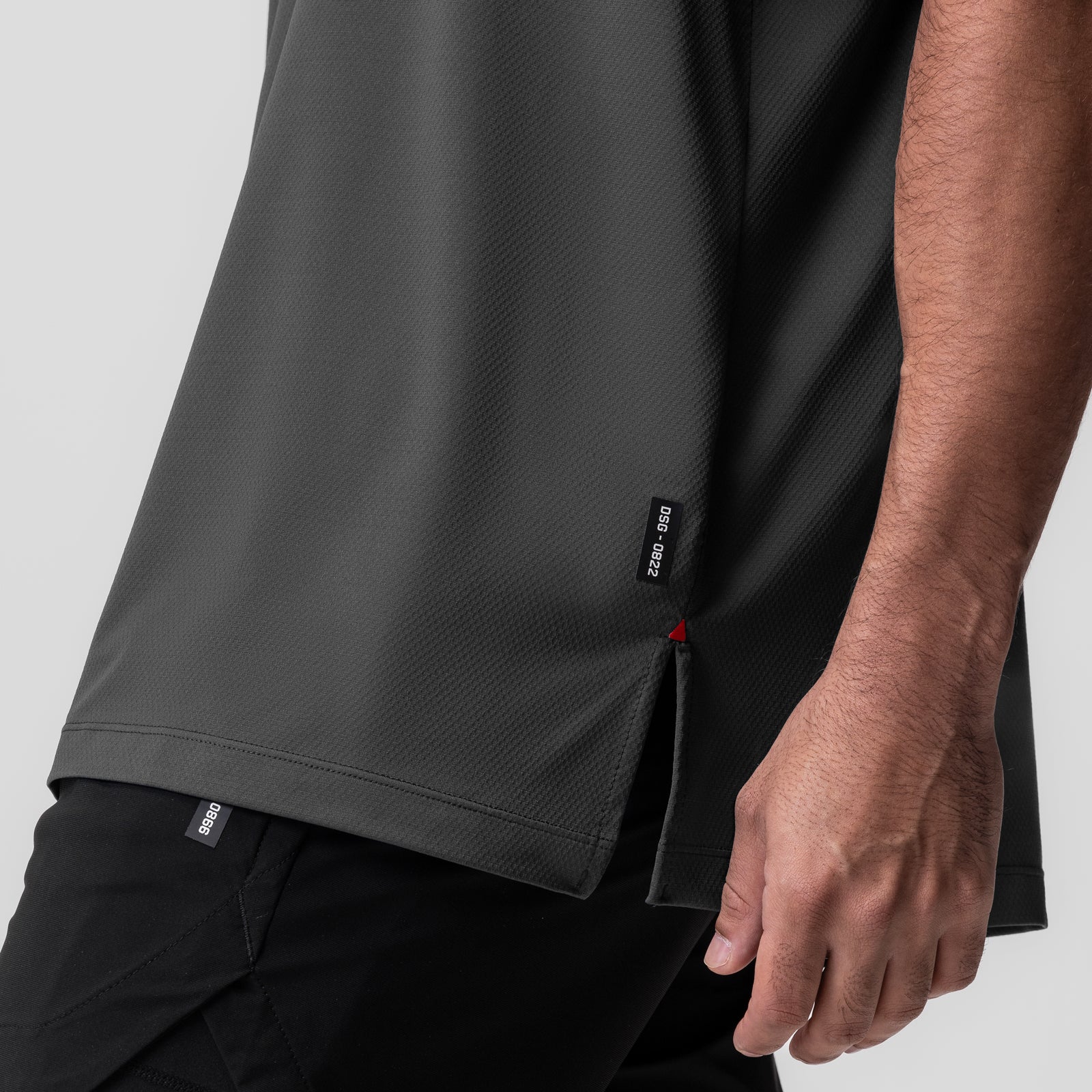 AeroSilver Oversized Tee in Space Grey worn by model, side view detail