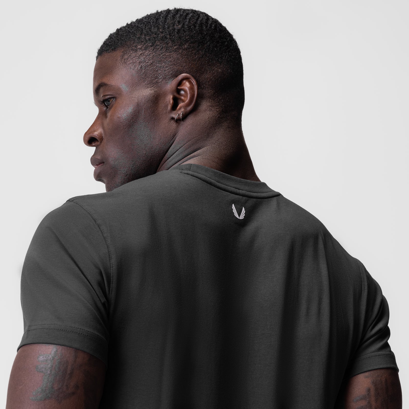 Supima Essential Tee in Space Grey worn by model, back view