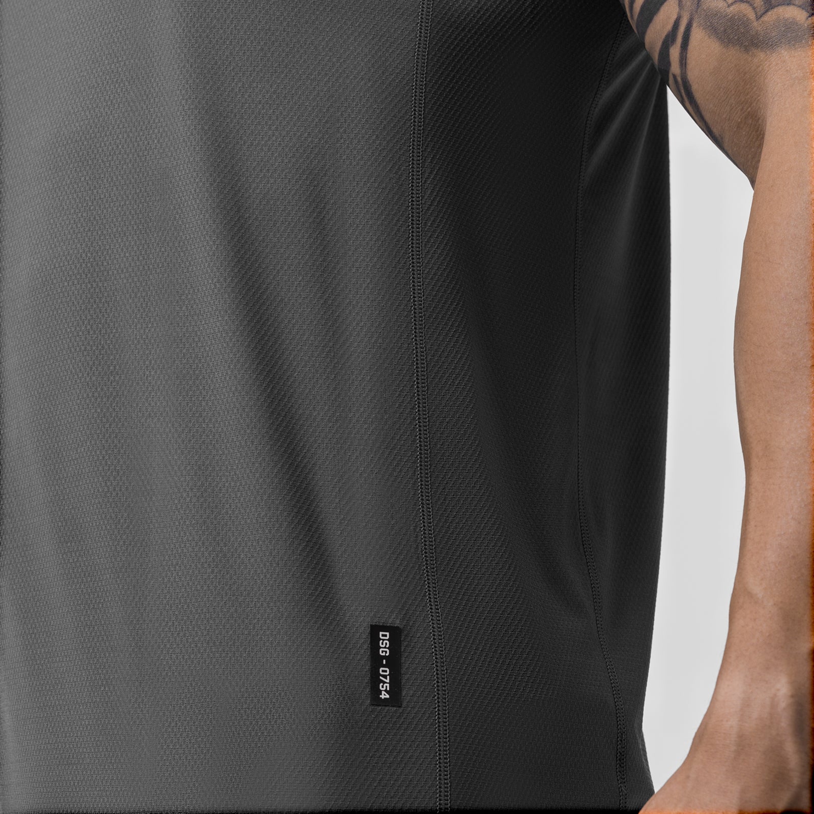 AeroSilver Training Singlet in space grey worn by model, side view
