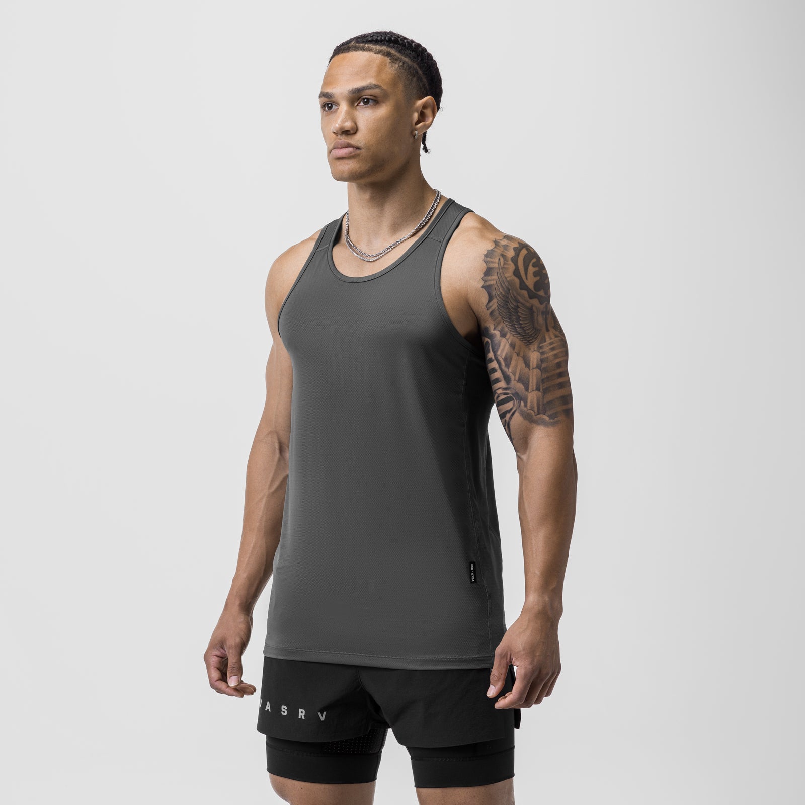 AeroSilver Training Singlet in space grey, worn by model standing against white background