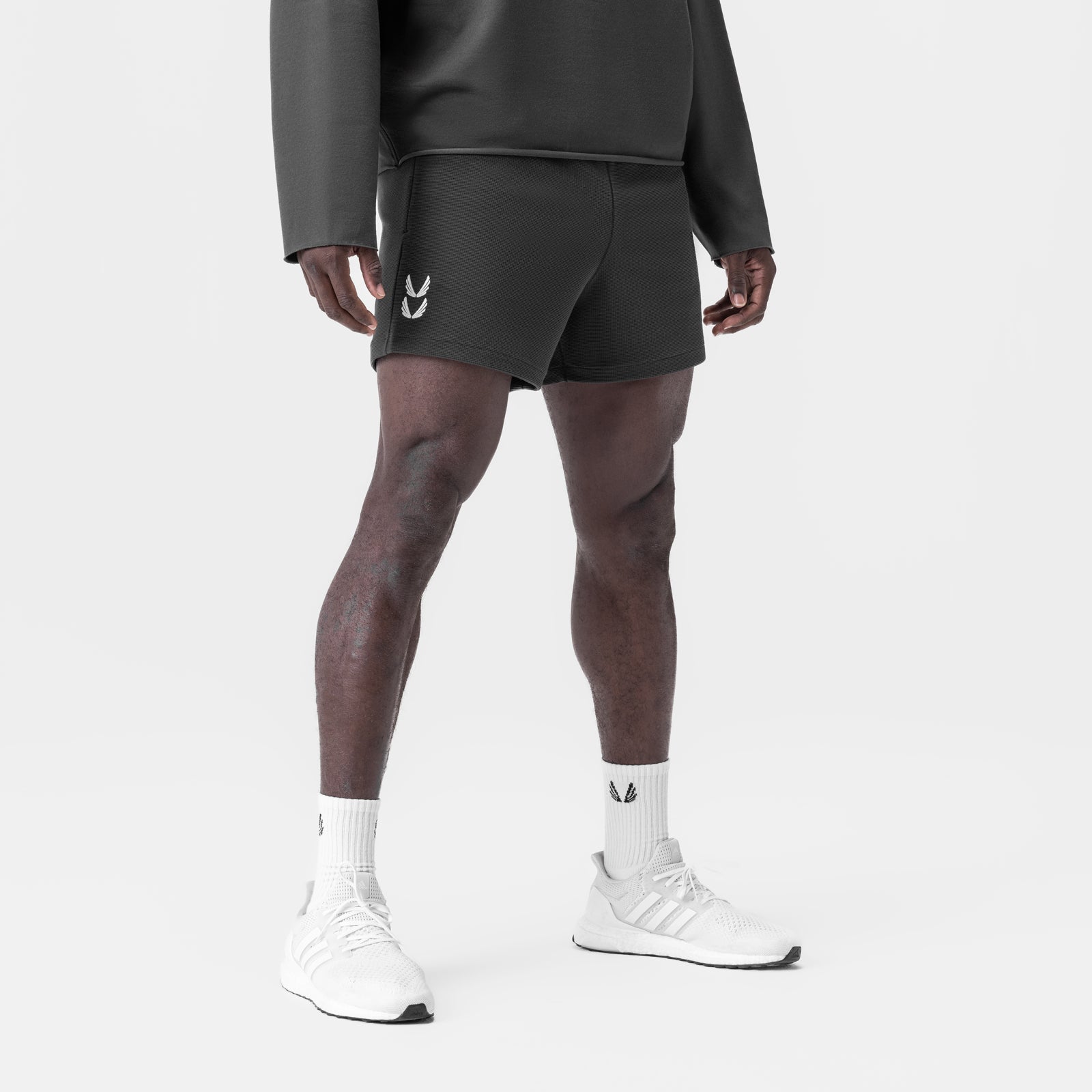 Waffle Knit Sweat Short in Space Grey, worn with white socks and sneakers, front view